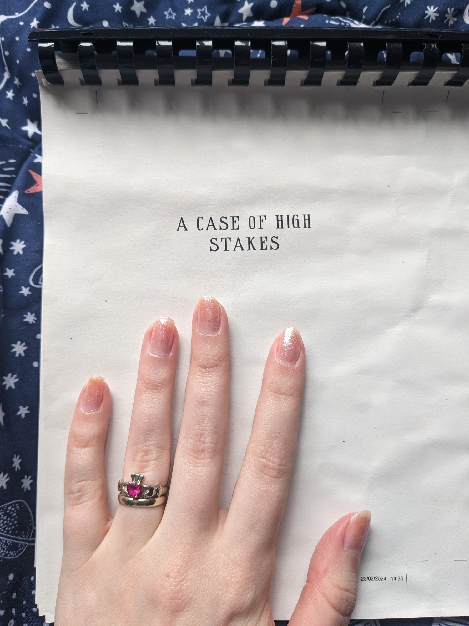 My hand on my manuscript for my new book A Case of High Stakes