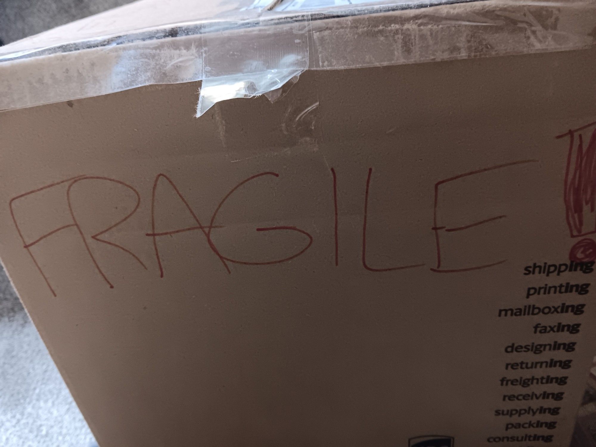 Picture of a box with fragile writing on it