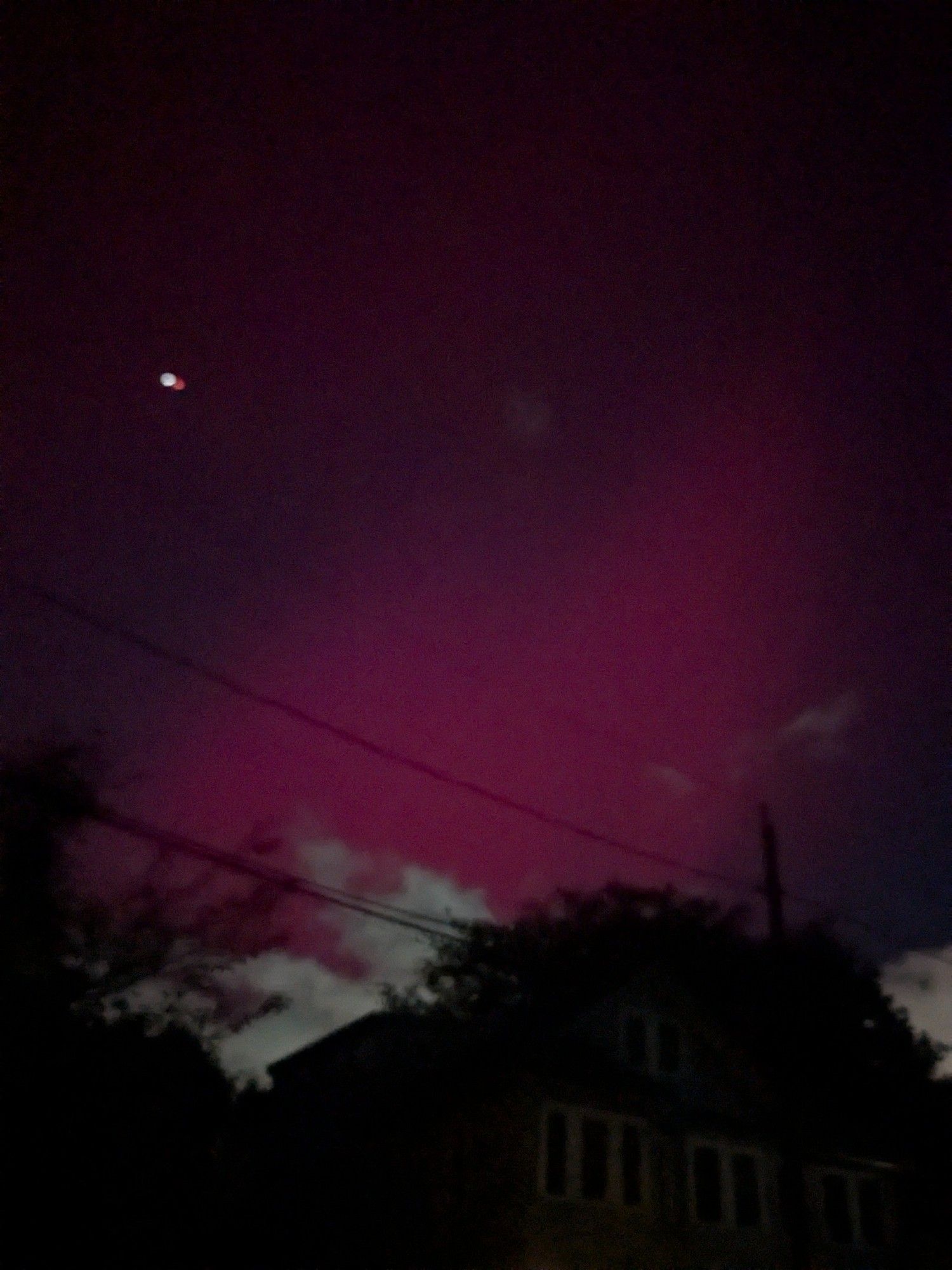 A deep magenta glow in the sky 