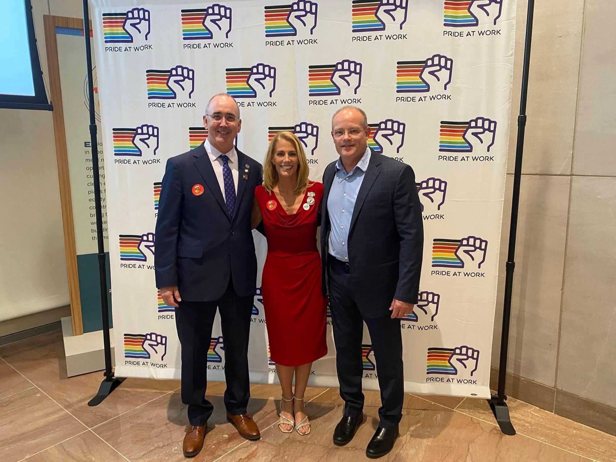 Three International Presidents - UAW Pres. Shawn Fain, AFA-CWA Pres. Sara Nelson, IAM Pres. Brian Bryant - together at the Pride at Work Solidarity awards night.