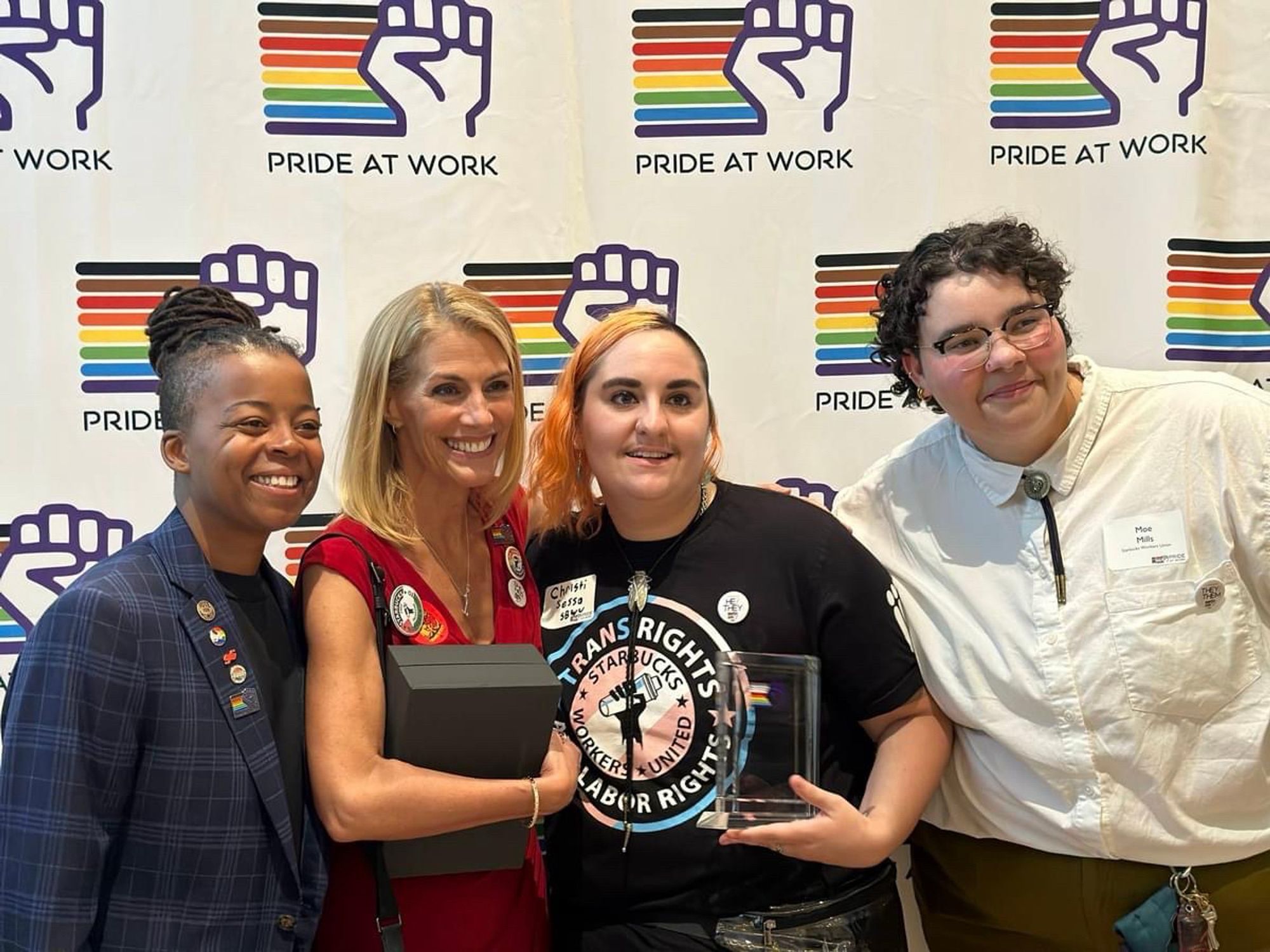 AFA-CWA Int’l VP Keturah Johnson standing with 2024 Pride at Work Solidarity Award winners at the 30th Anniversary of Pride at Work.