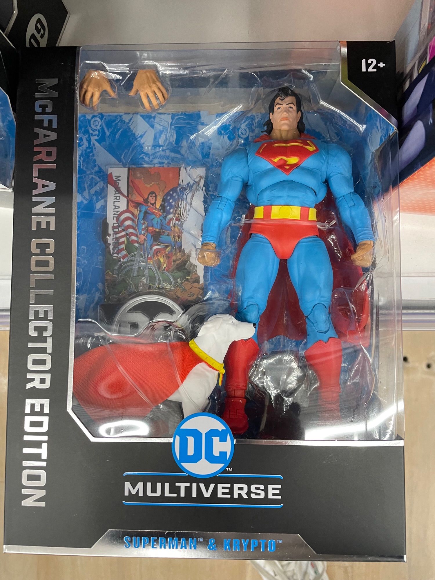 A McFarlane Toys DC Comics action figure boxed set featuring Superman rocking his ‘90s-era mullet and Krypto the Superdog. A set of extra hands for optional posing and a stand for the figures is included, as well as some amazing artwork on the box from the 1990s Superman run.