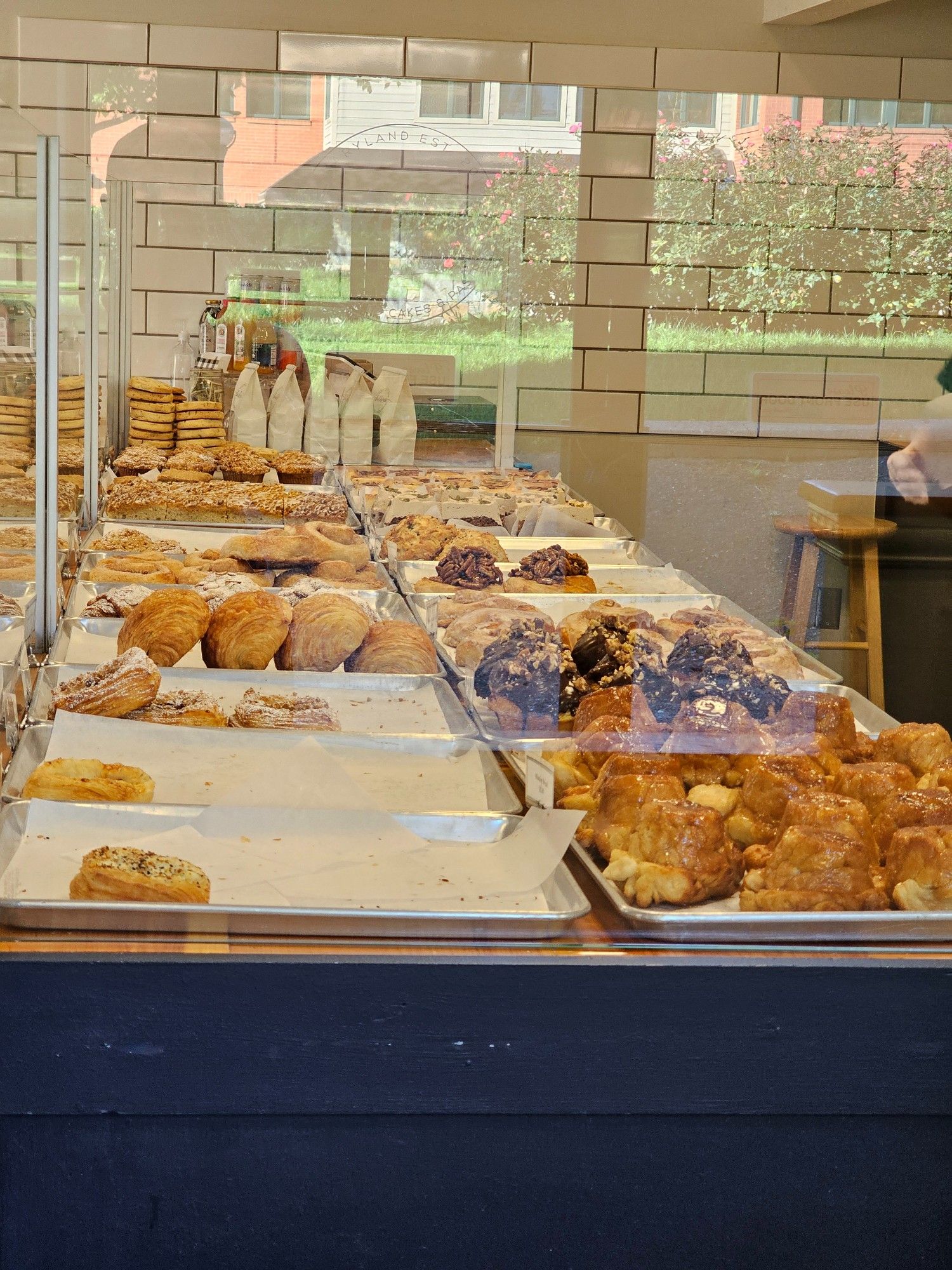 A picture of a bakery display case filled with fast-selling pastries