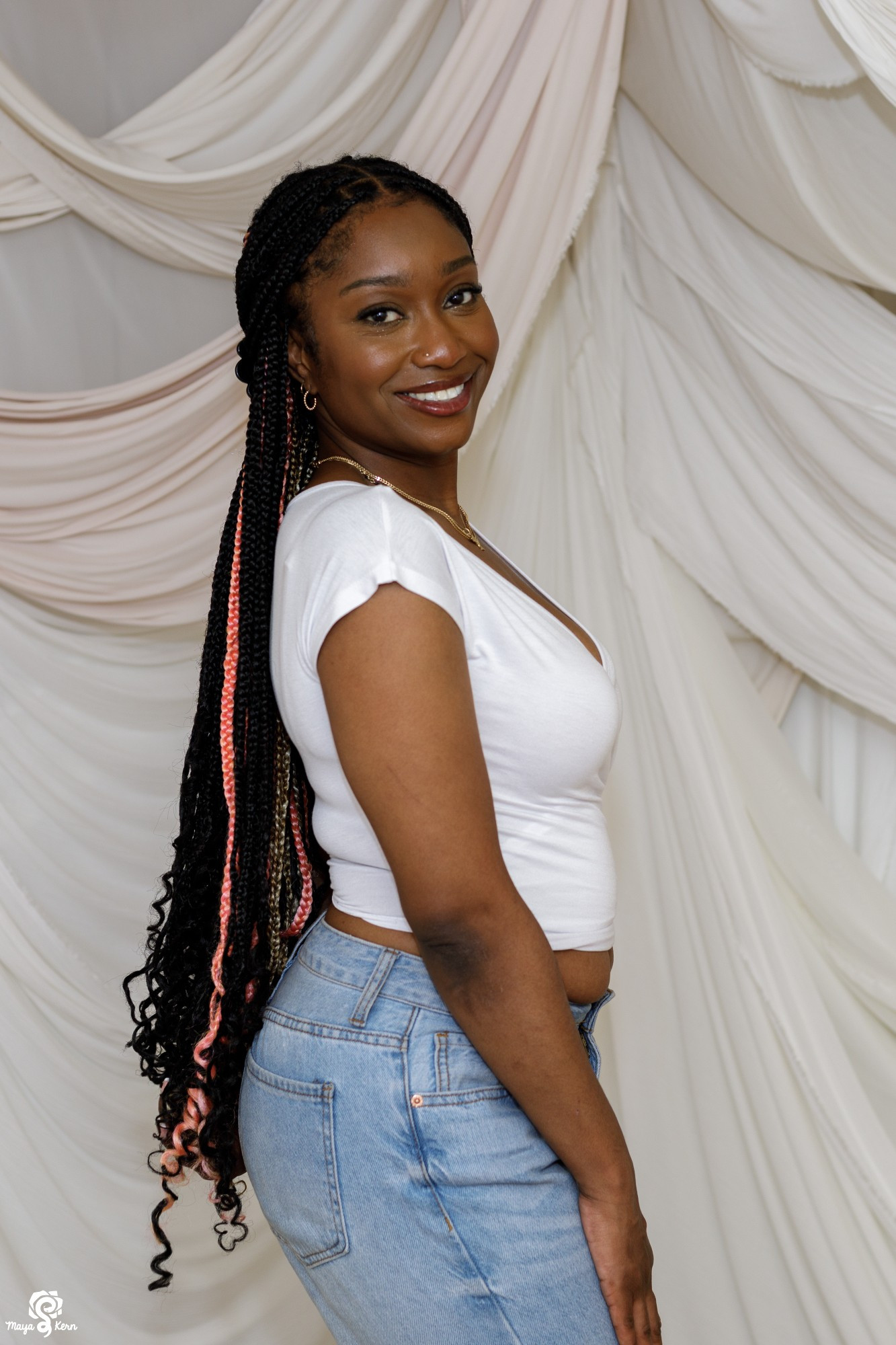 image of a mid size woman modeling a white faux wrap crop top