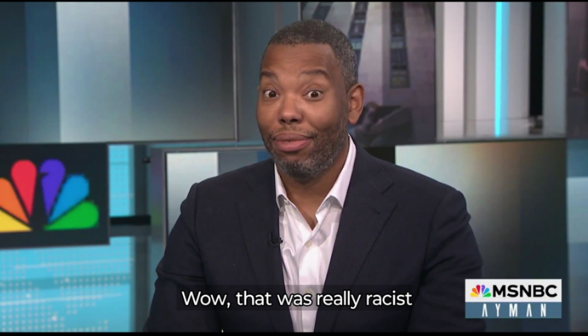 Ta-Nehisi Coates with a wry, amused and surprised look on his face, with subtitles reading:
Wow, that was really racist