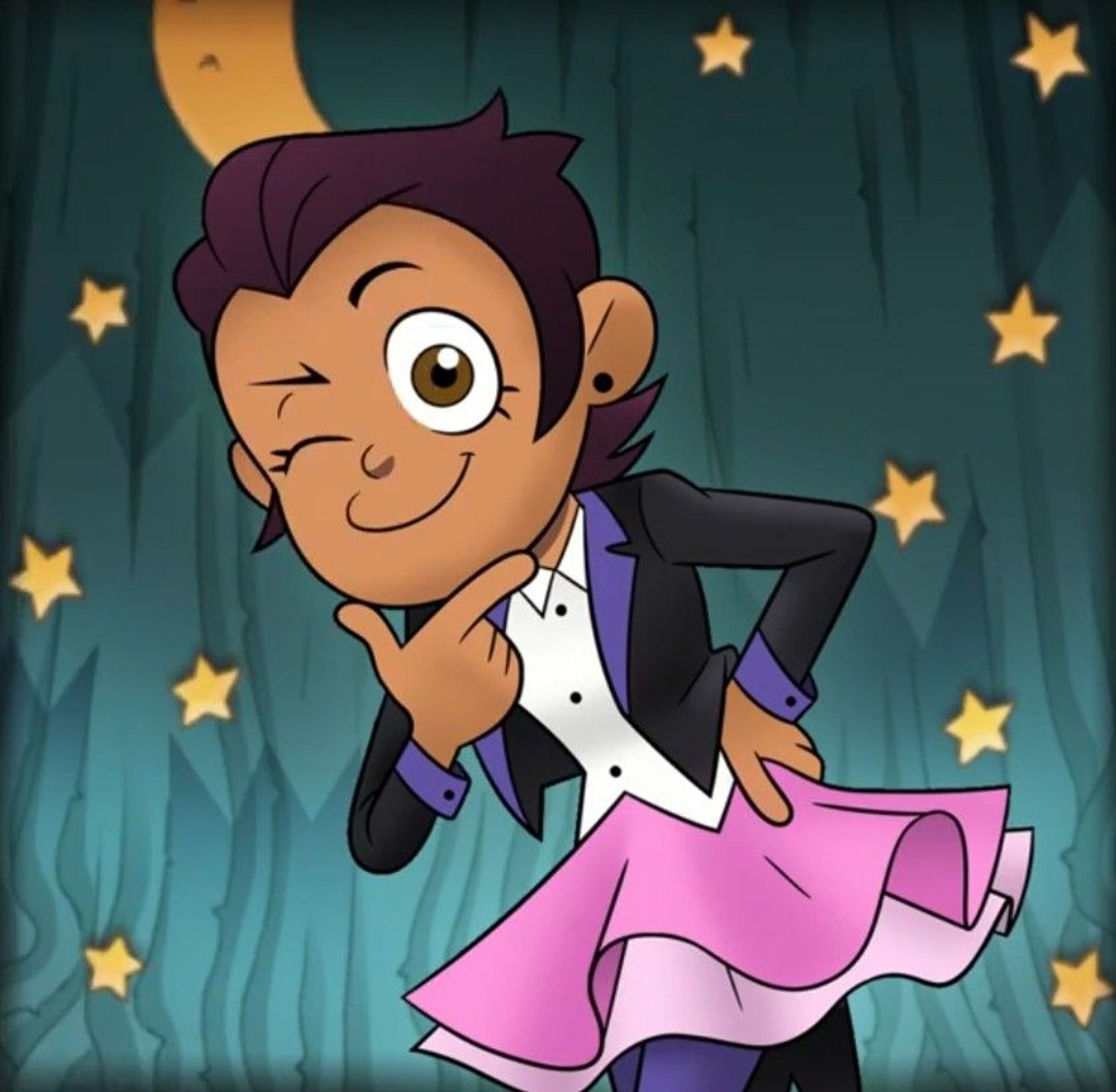 Luz winking in front of a backdrop decorated with stars and a quarter moon. She's wearing a tuxedo with a pink skirt.