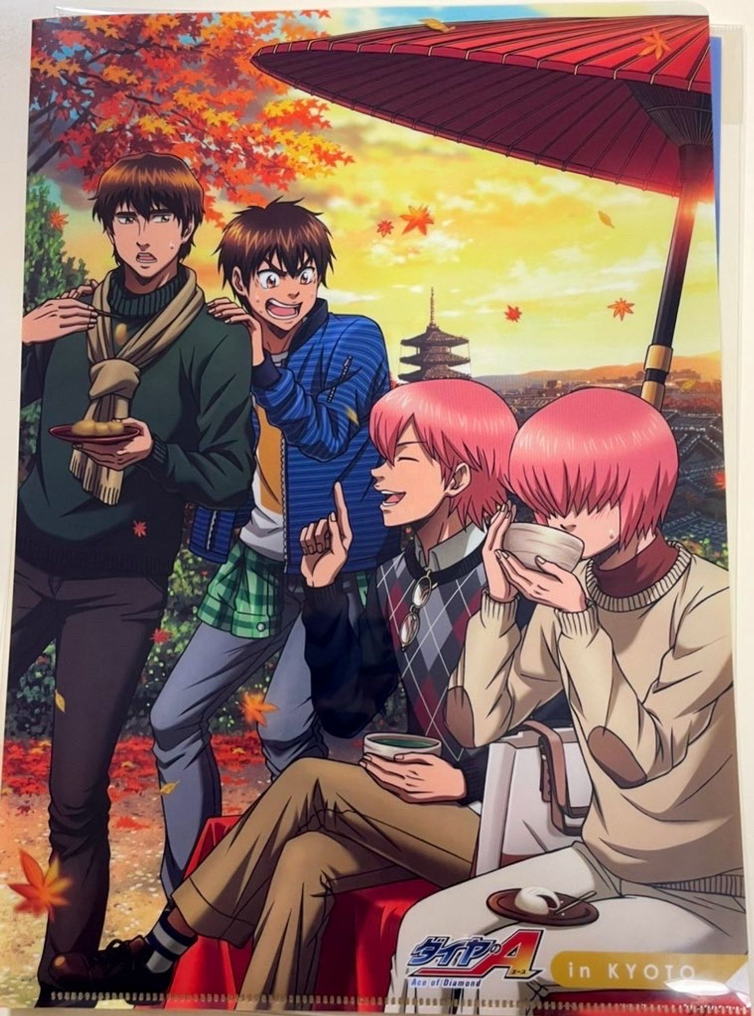 Official art of daiya no ace. This is a clear file of chris, eijun, ryosuke, and haruichi in Kyoto. Chris is in the left background, food falling from his chopsticks because eijun (center background) grabs onto his shoulder suddenly. Ryosuke (middle foreground) and haruichi (right foreground) are lounging on a bench snacking and drinking bowls of tea. Chris is wearing a dark green turtleneck, black jeans, and a khaki scarf on top. Eijun is wearing blue jeans, a green striped long sleeve shirt tied around his middle, a white tee with an orange square, and a blue striped jacket on top. Ryosuke is wearing a collared shirt with a navy argyle sweater over it, light brown pants, and dark brown dress shoes. Haruichi is wearing a burgundy mock neck shirt with a khaki crew neck sweater with brown elbow pads, and white jeans. It is fall, with orange leaves everywhere.