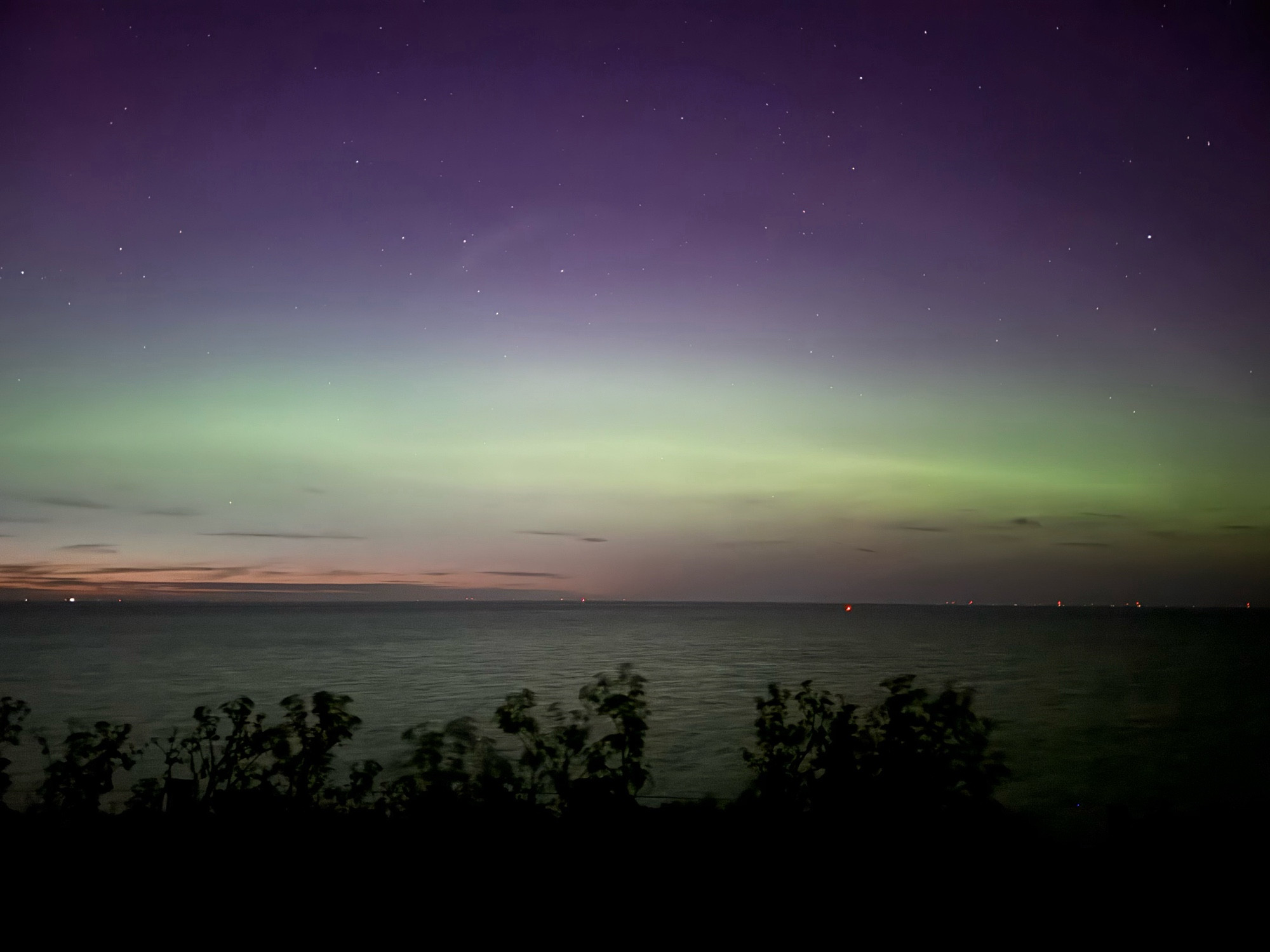 The sky facing north from Reculver Towers in East Kent. Although it’s past 10pm the sky is light with a mostly green glow from the aurora borealis