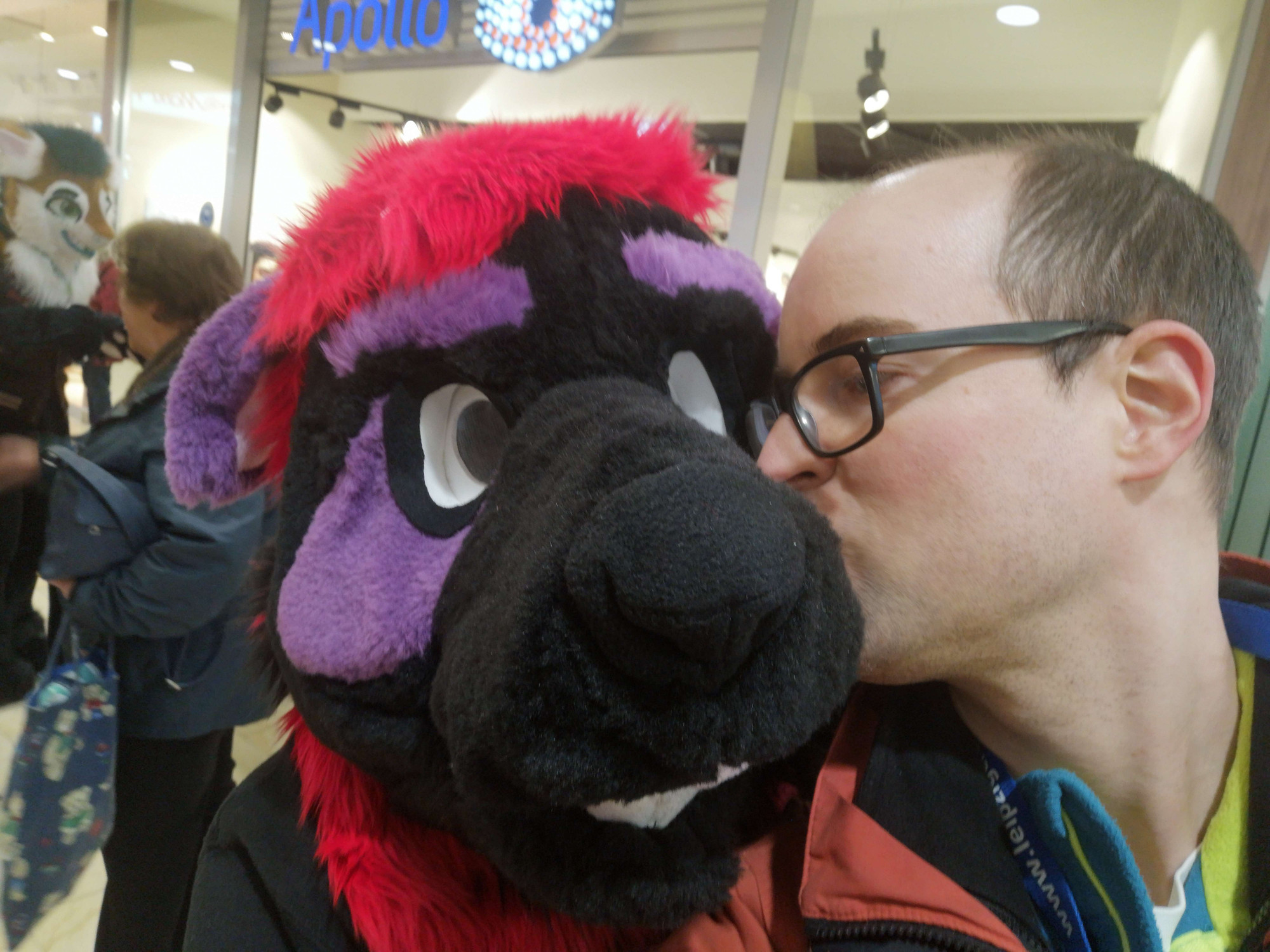 Me kissing Beusa wearing his labrador fursuit head