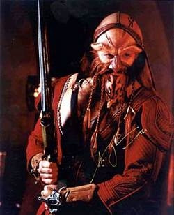 General Ka D'Argo from Farscape holding his qualta blade.