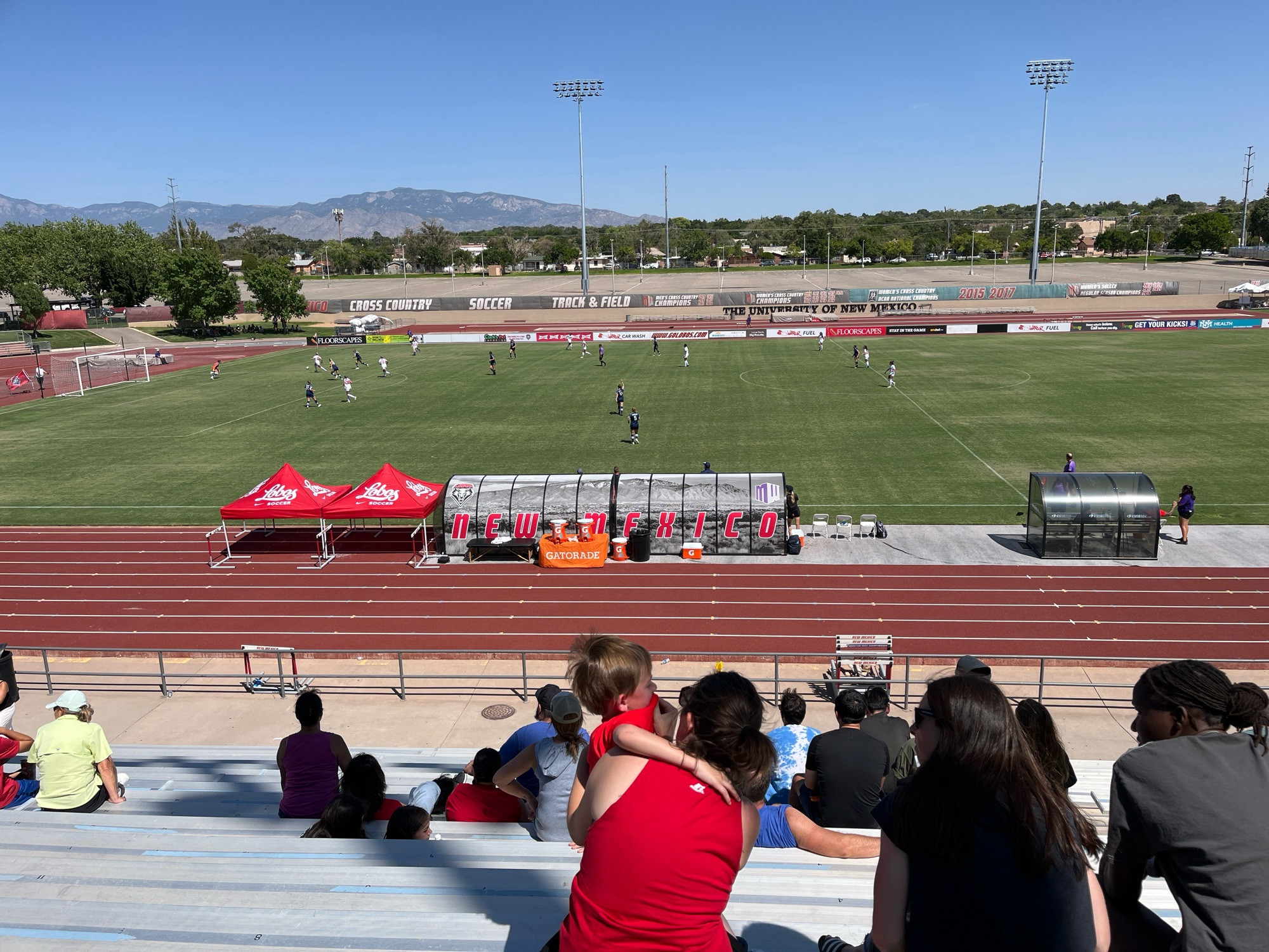 Picture of UNM soccer complex with players on field