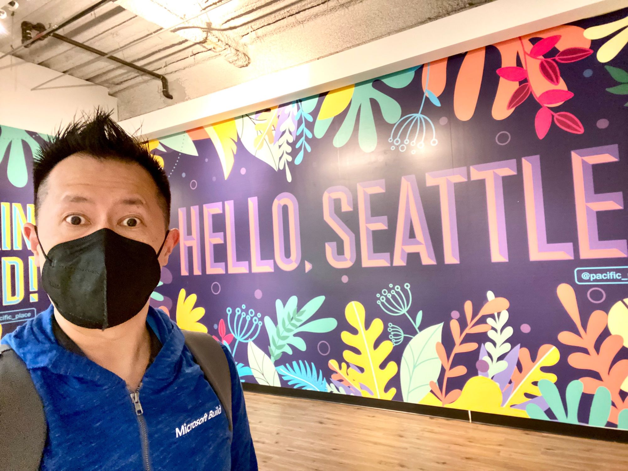 Anthony in front of “hello Seattle” 