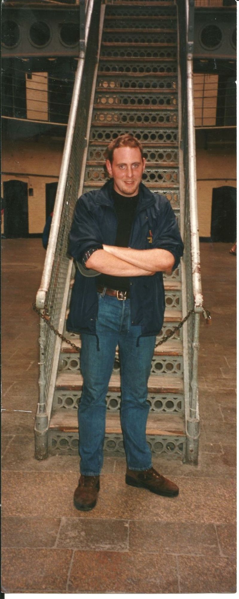 someone who used to be me, standing at the bottom of the stairs at Kilmainham Jail, Dublin