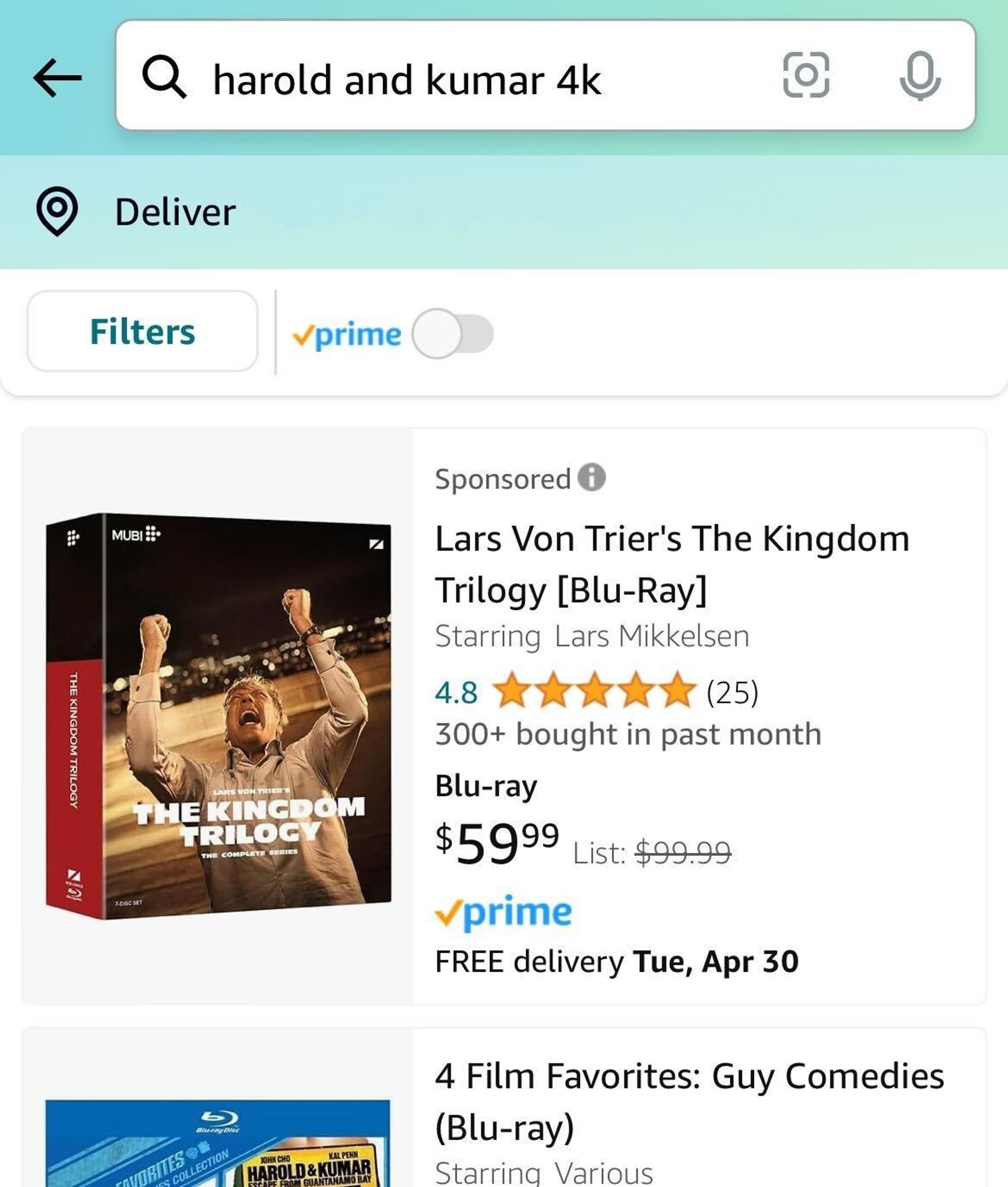 The amazon app showing a search for "harold and kumar 4k" where the first, sponsored result is "Lars Von Trier's The Kingdom Trilogy [Blu-Ray]"