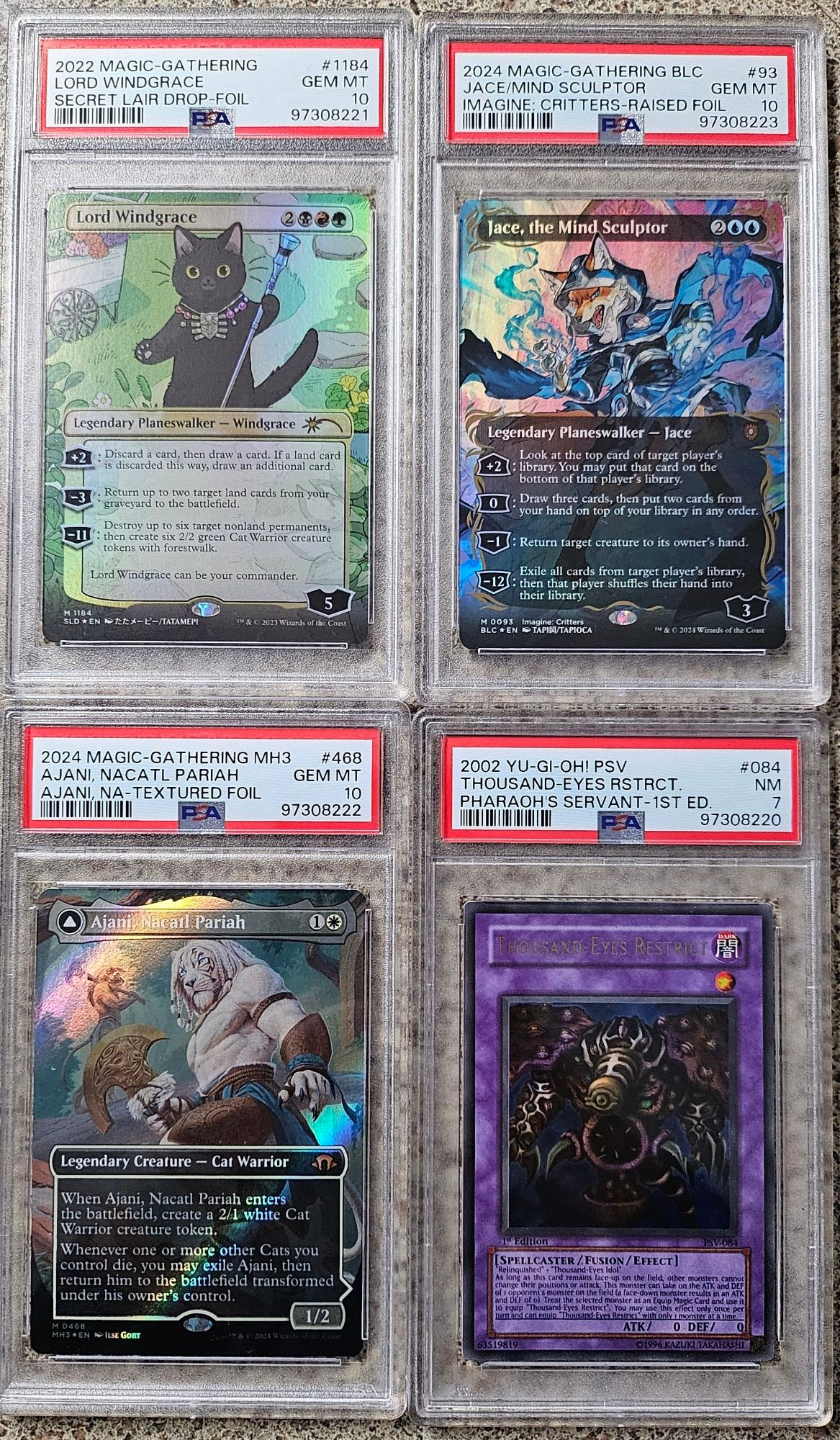 PSA-graded slabs containing: Lord Windgrace (Grade: 10), Jace, the Mind Sculptor raised foil (Grade: 10), Ajani, Nacatl Pariah (Grade: 10), and Thousand Eyes Restrict (Grade: 7).