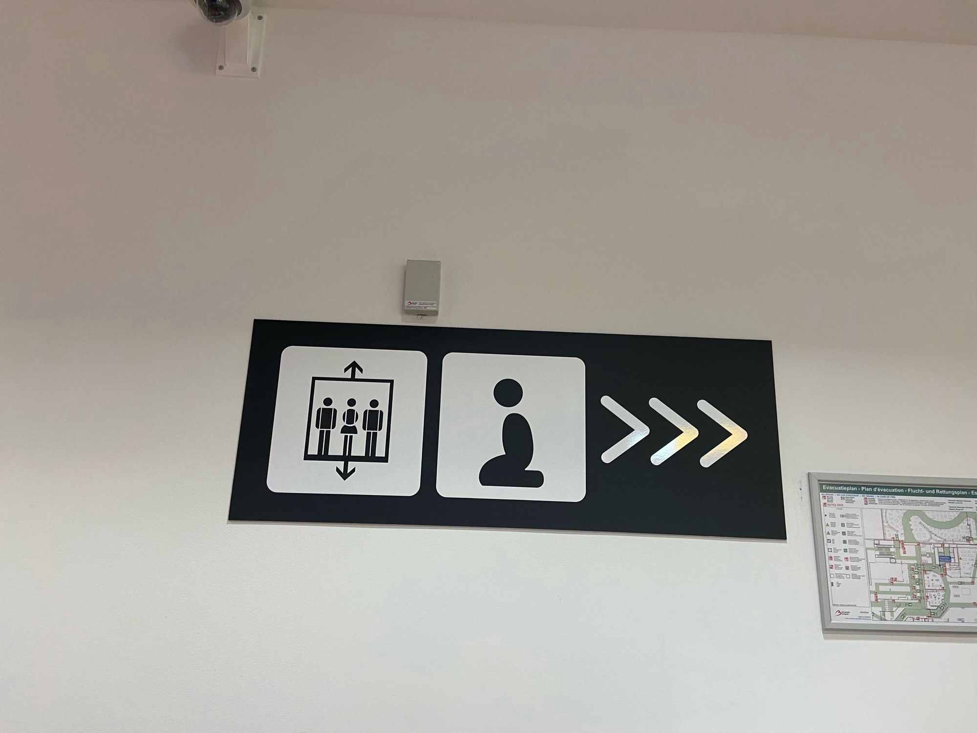 Prayer symbol in an airport