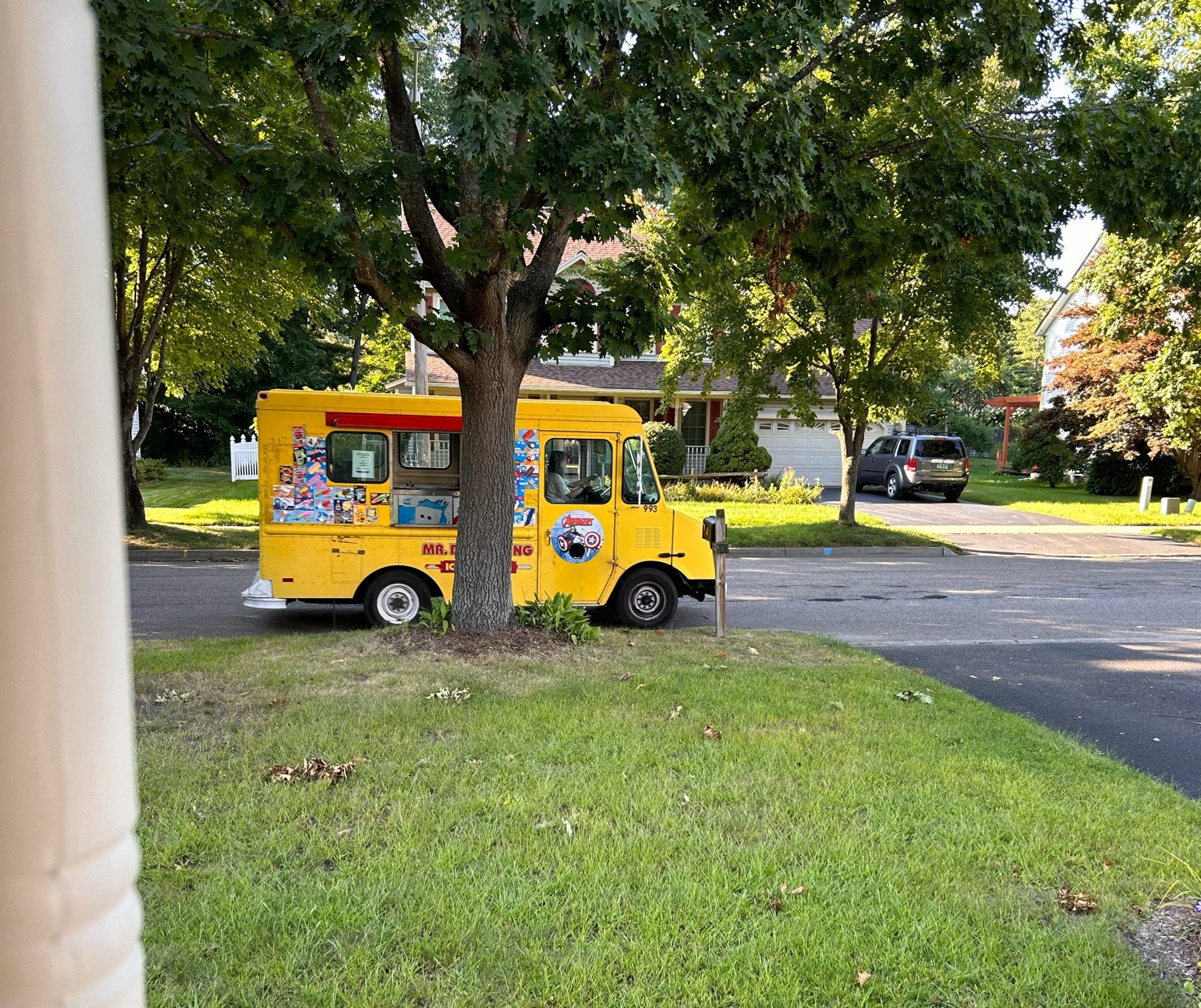 Yellow Mr. Ding-a-ling ice cream truck.