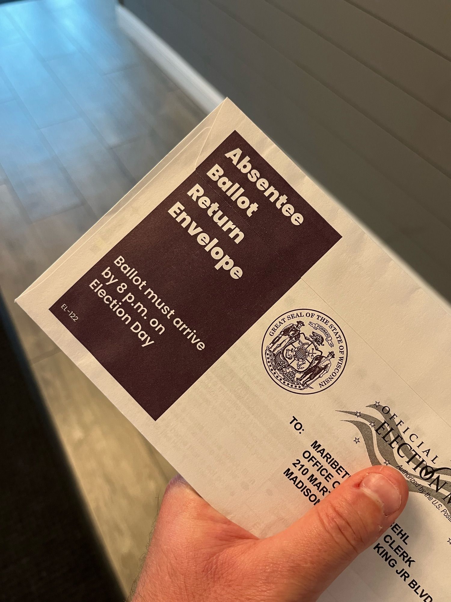 An absentee ballot envelope ready to go in the mail