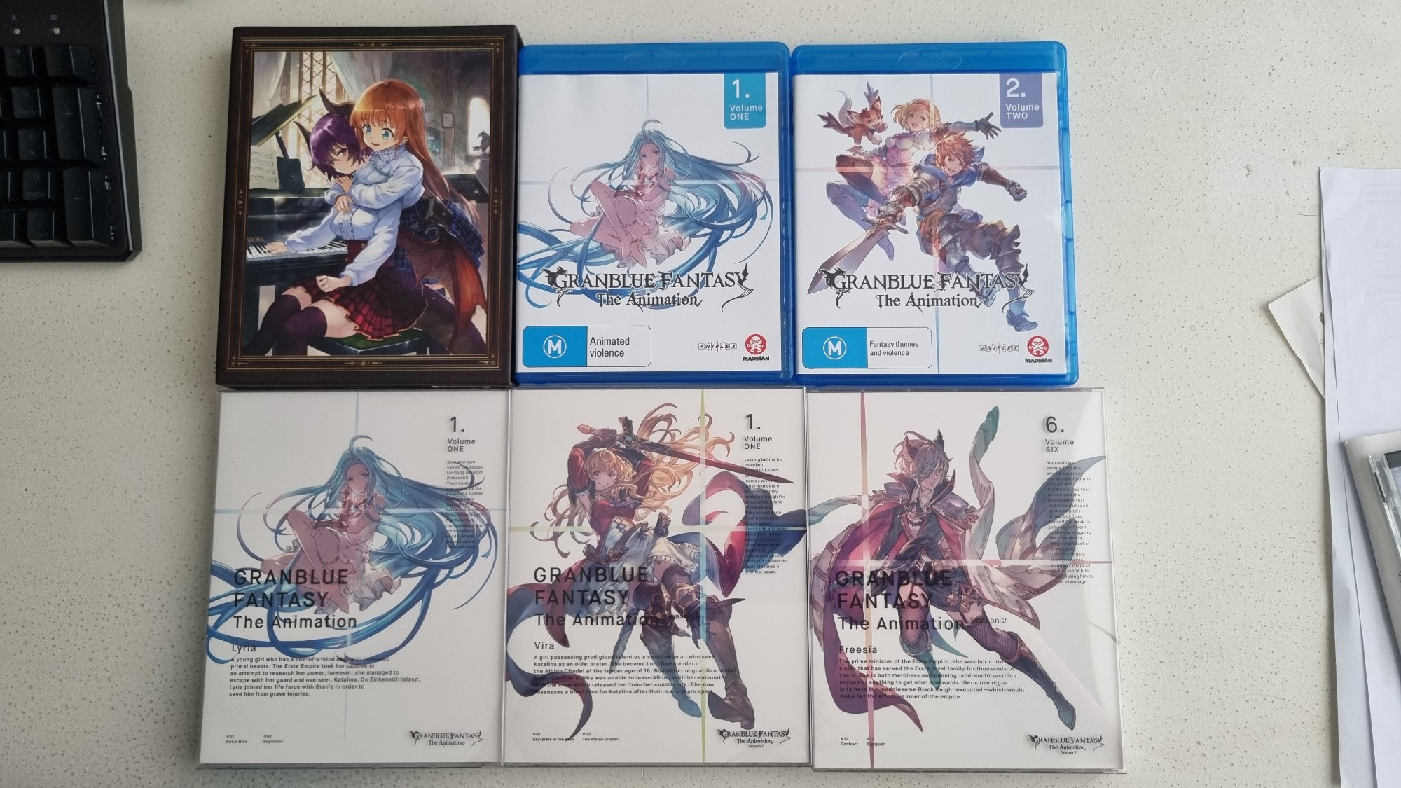 The manaria friends blu ray box set, season 1 of the granblue fantasy anime blu rays, and jp copies for season 1 volume 1, season 2 volume 1, and season 2 volume 6