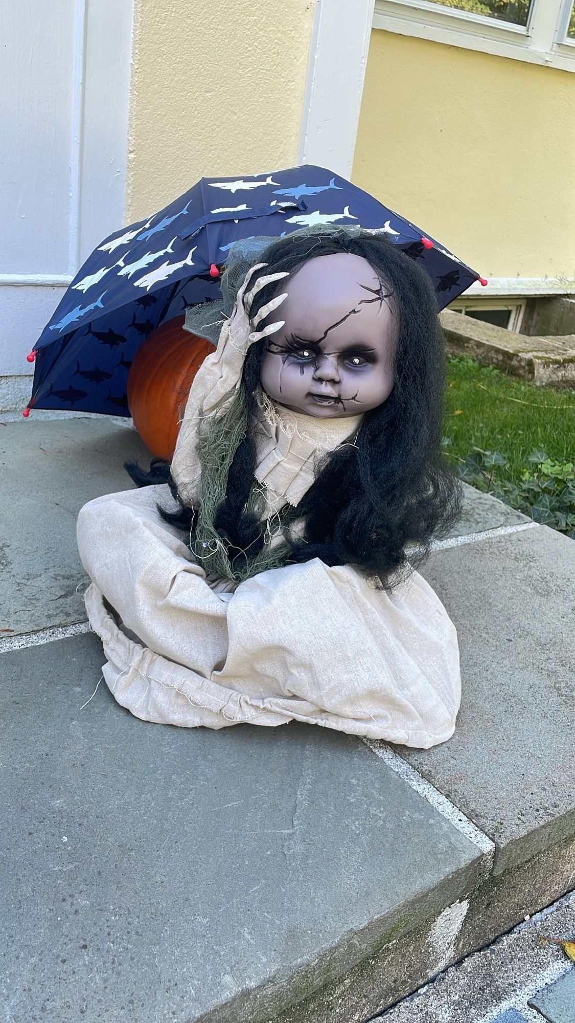 A creepy baby decoration with hair