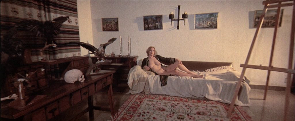 A nude woman posing for a painter 