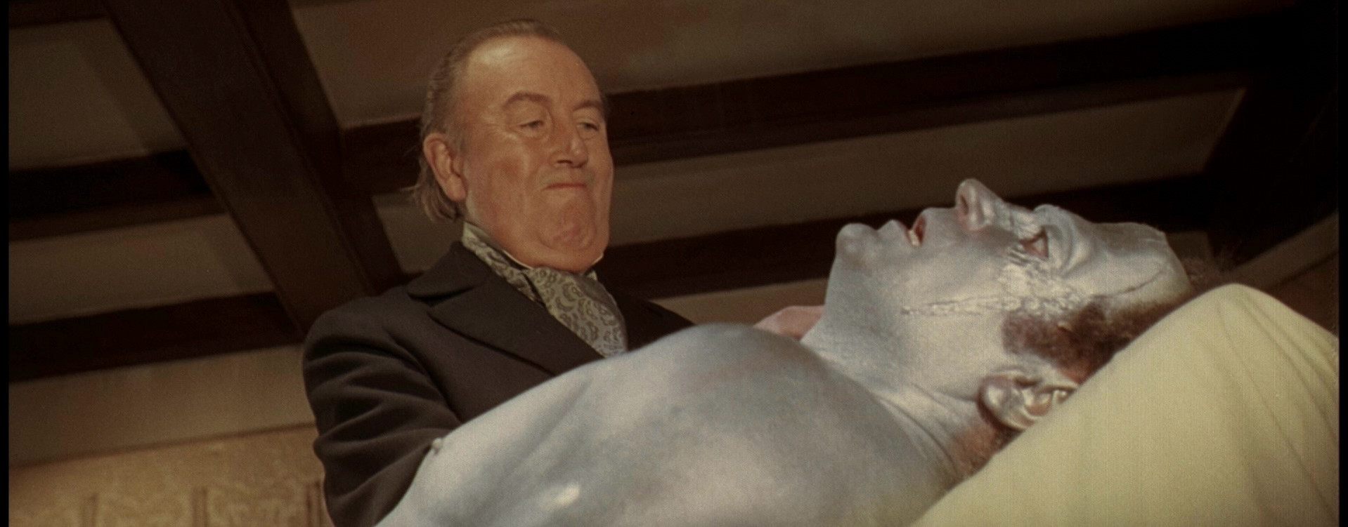 Dr. Frankenstein over his latest creature 