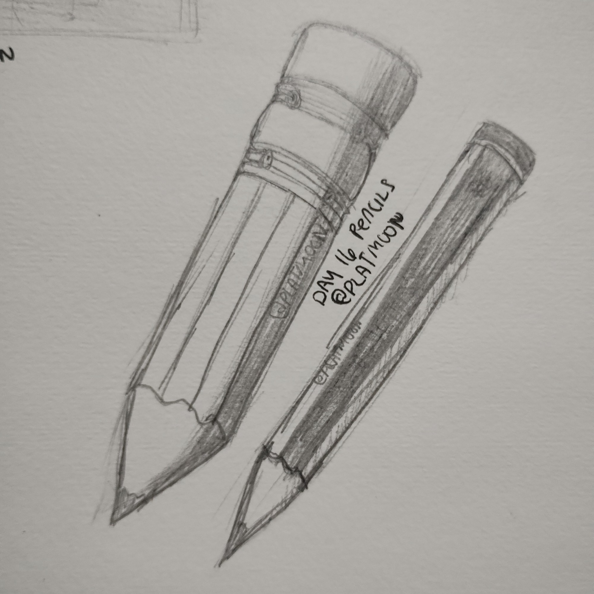 sketch of two pencils, one looks like a #2, one is a hb pencil