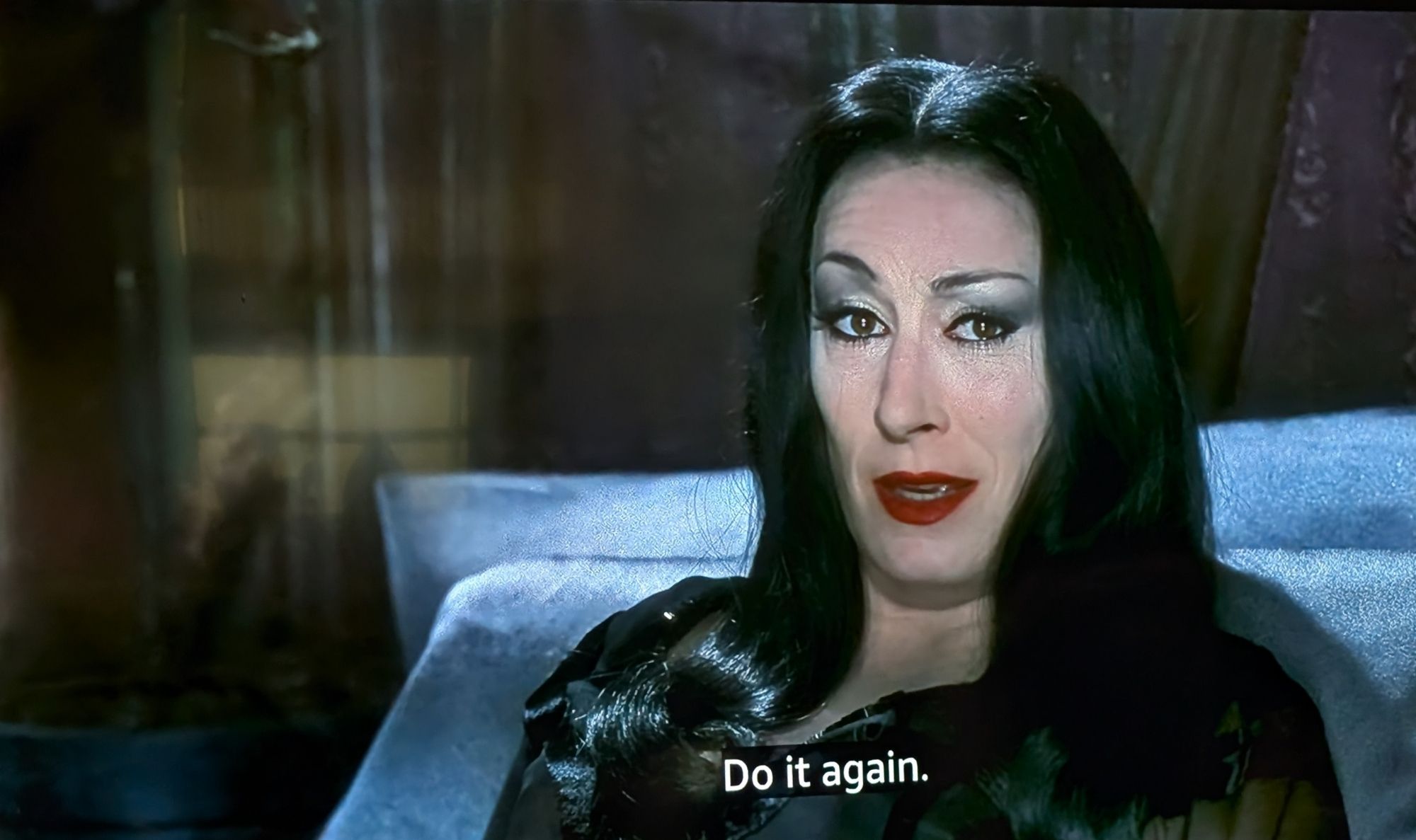 morticia saying "do it again"