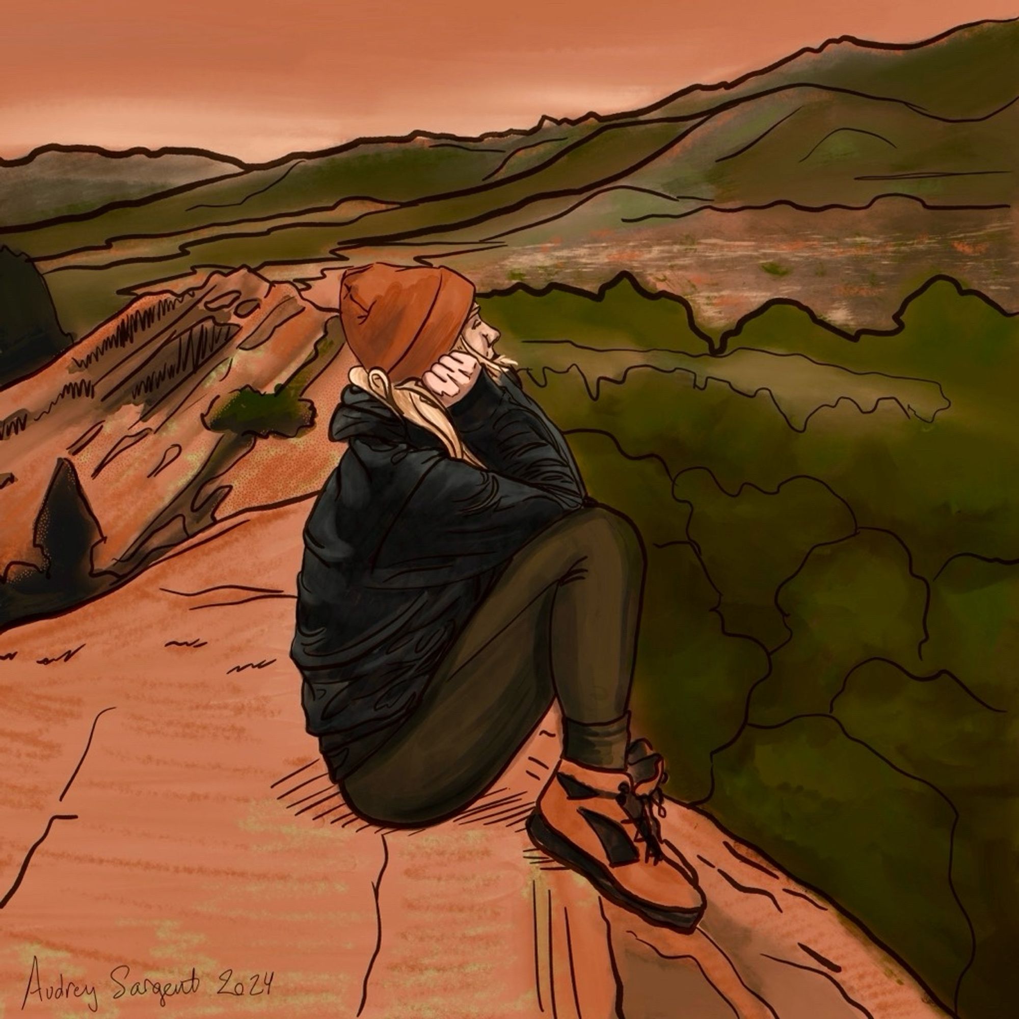 A blonde girl in hiking clothes sits on top of a rusty colored rock formation covered in lichen, chin resting on fists and knees. Trees and a view of the city and the Rocky Mountains stretch before her. The sun is setting.