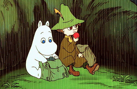 Gif of Snufkin and Moomintroll (Two characters from the Japanese/Finnish cartoon Moomin) eating apples under the rain.
Moomintroll is taking the apple from a bagpack and Snufkin is already taking the first bite. 