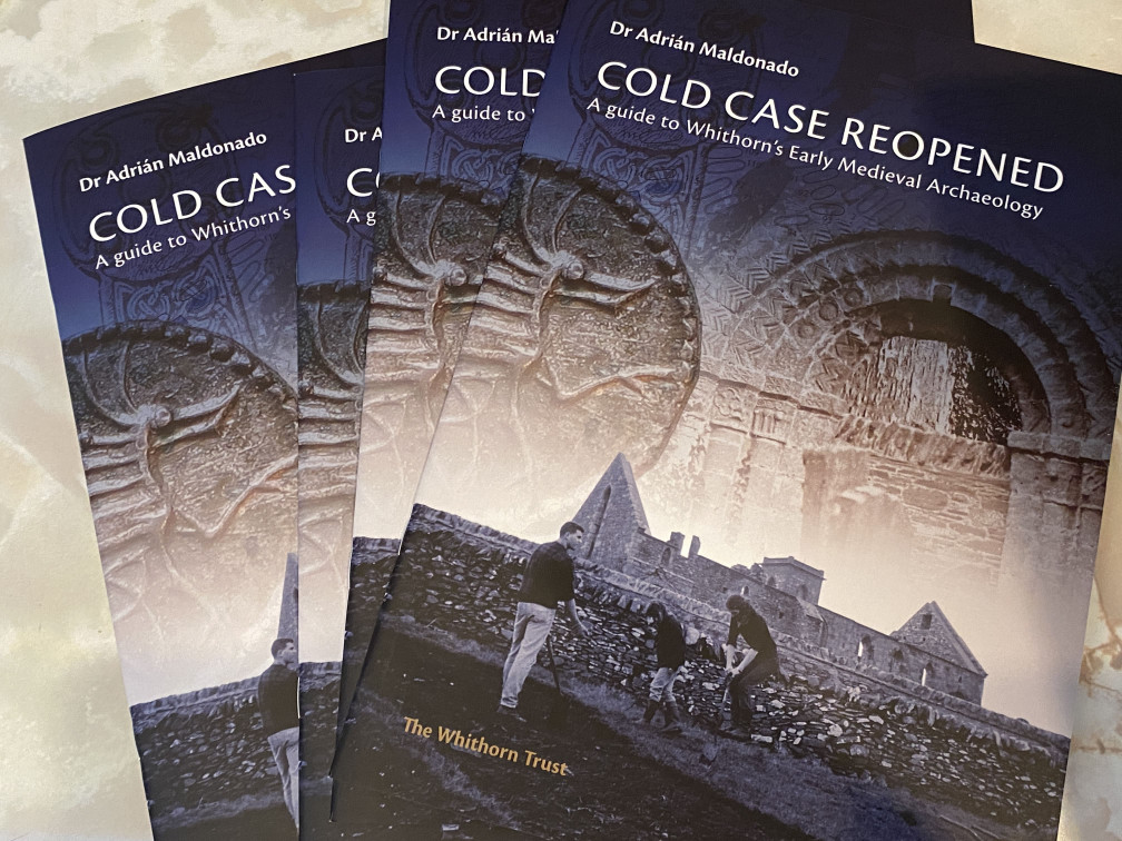 Fanned display of copies of the guidebook Maldonado, A. (2025) Cold Case Reopened: A Guide to Whithorn’s Early Medieval Archaeology. Whithorn: Whithorn Trust.