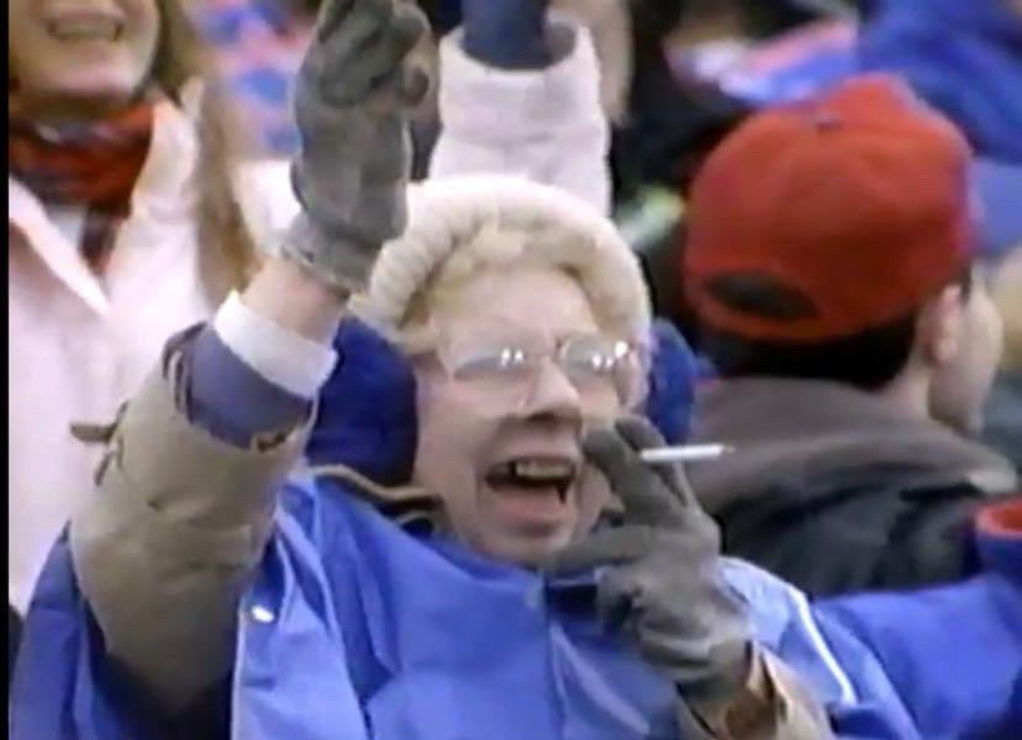 Old lady smoking at a bills game