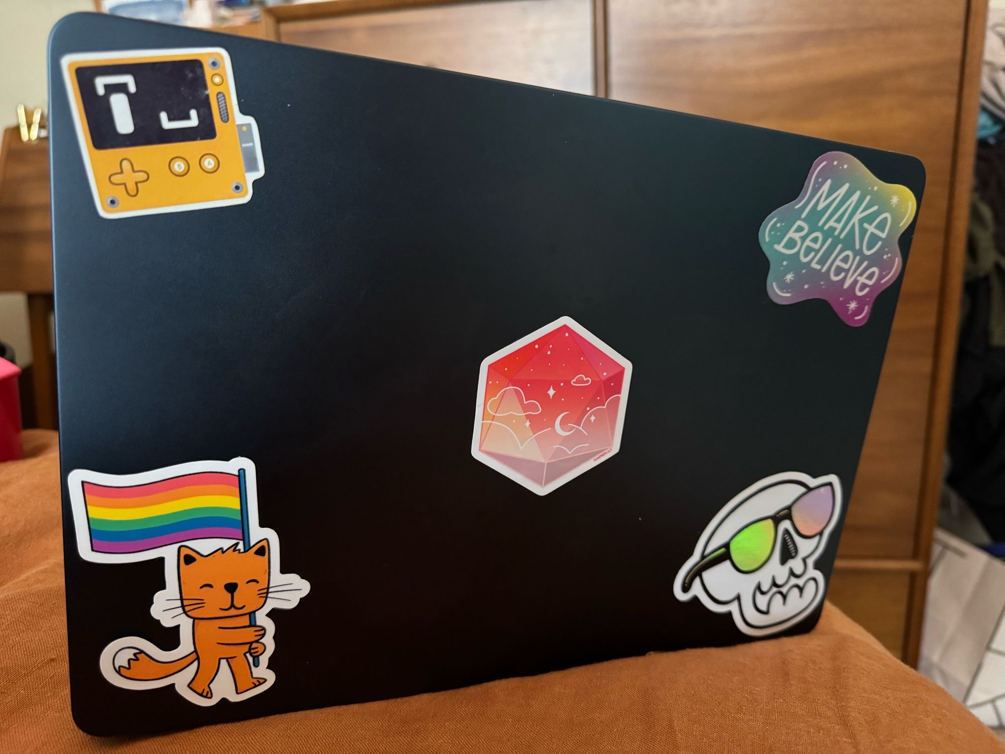 Stickers slowly beginning to proliferate on my new laptop