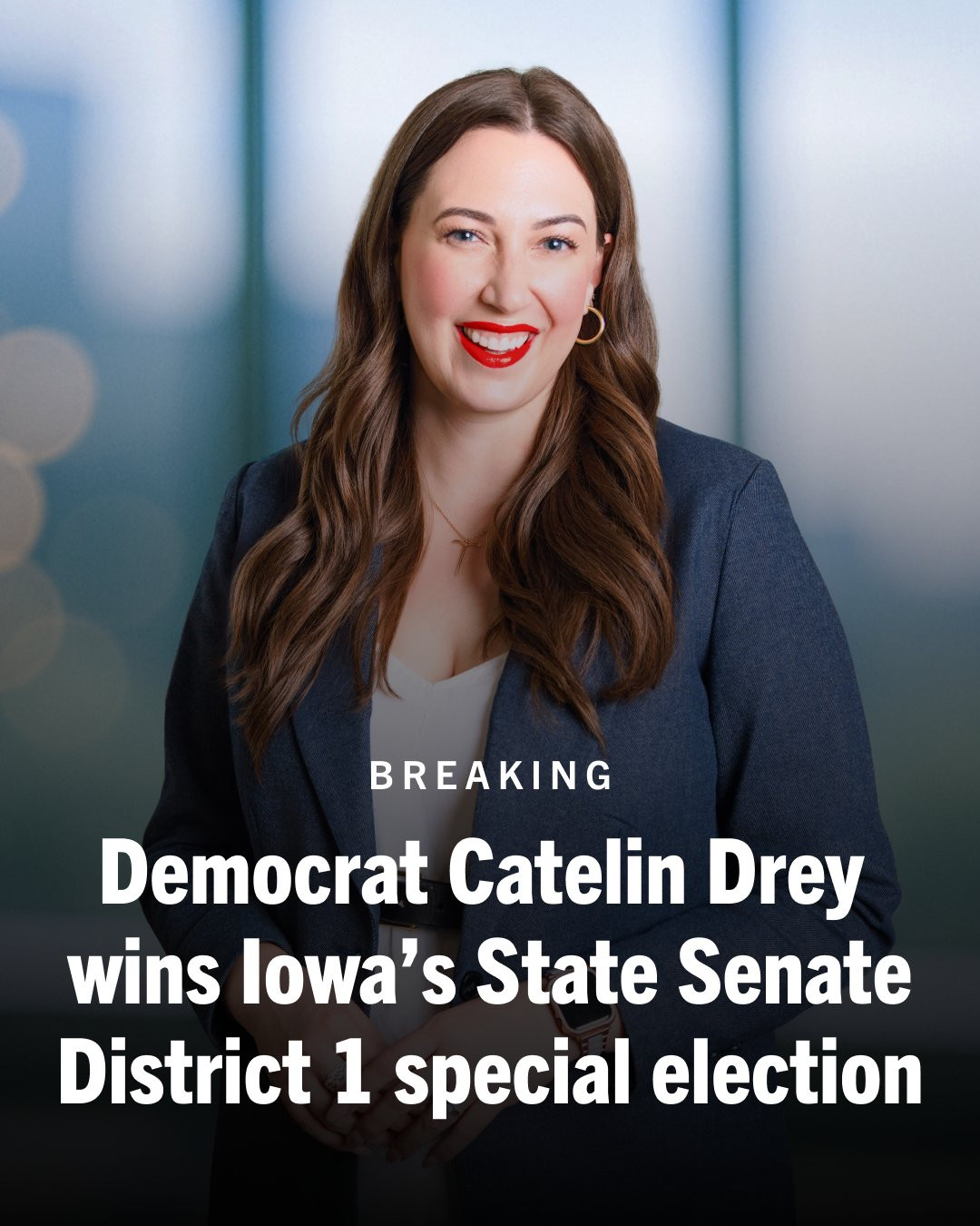 Breaking news graphic featuring Democrat Catelin Drey, who has just won Iowa's State Senate District 1 special election, standing in front of a blurred background.