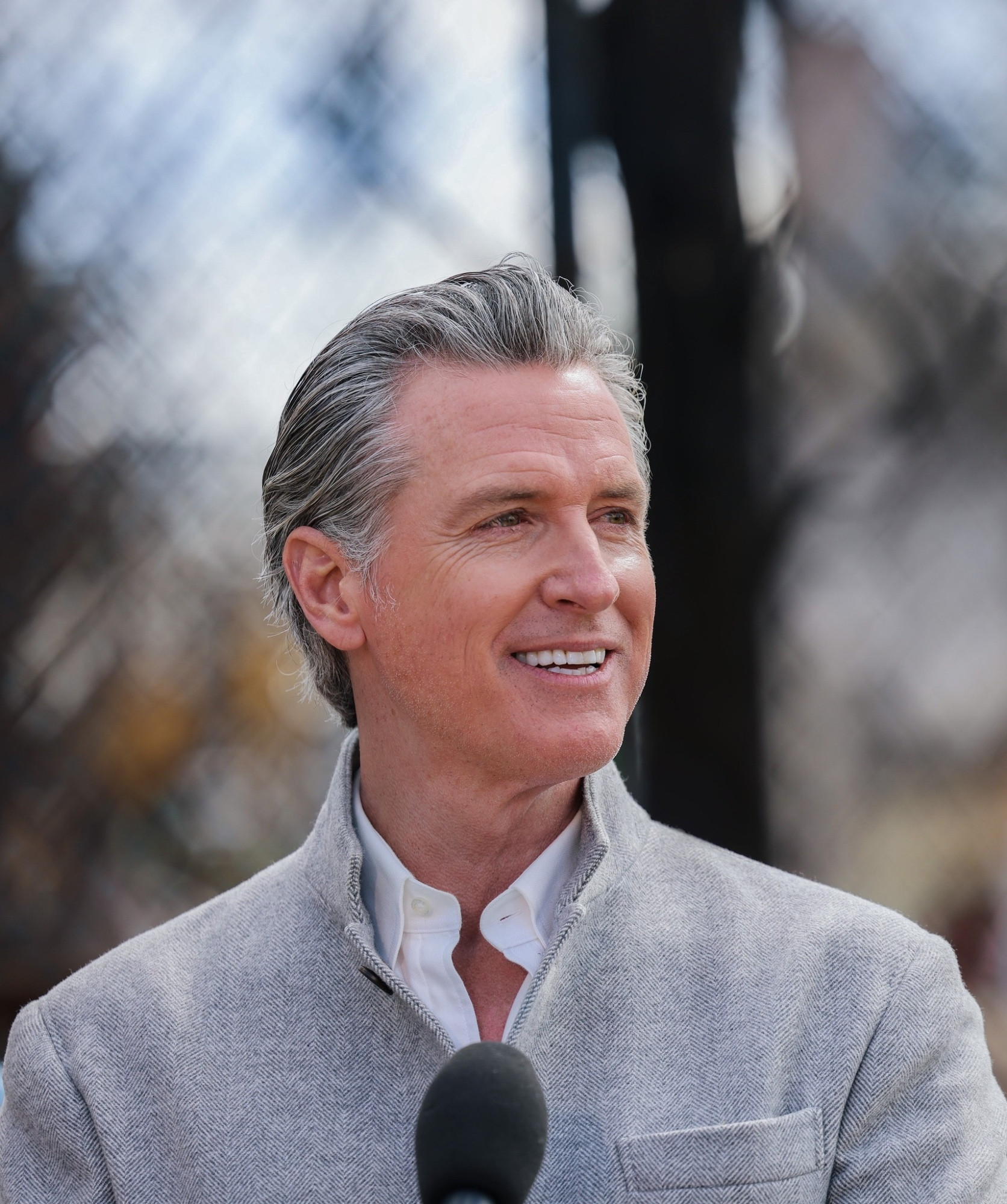 California Governor Gavin Newsom smiling.