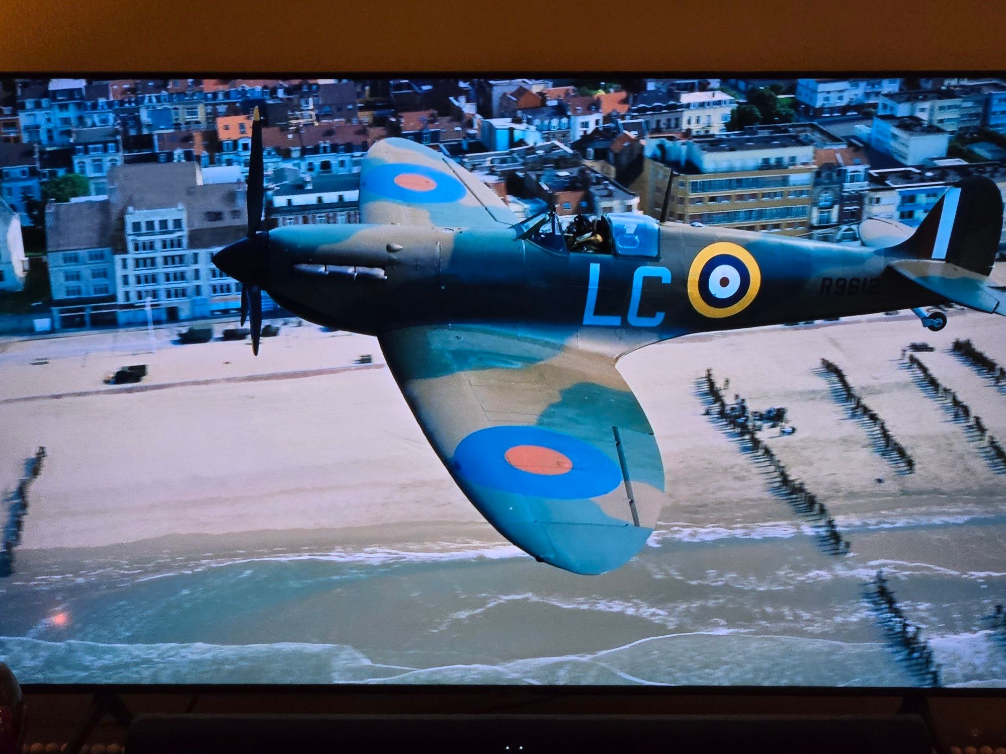 A British fighter plane from the movie Dunkirk with LC written on the side