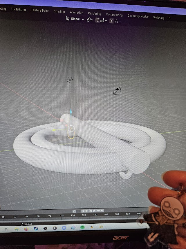 A screenshot of Blender with a Nier cosplay button formed from basic tube shapes