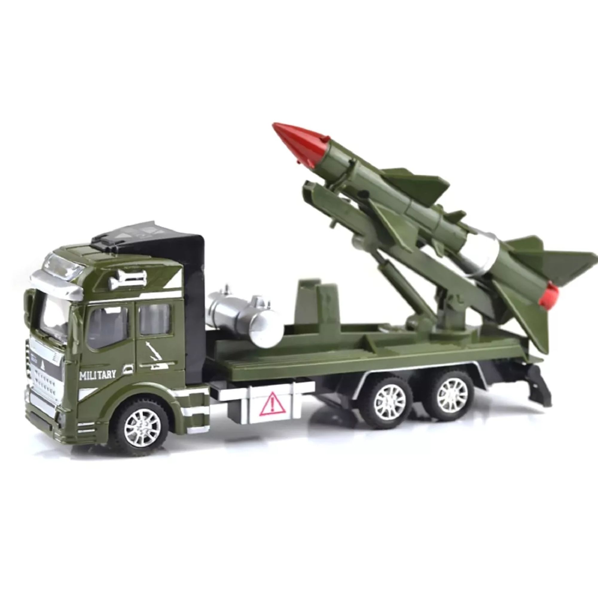 Big truck with a large missile on the back.