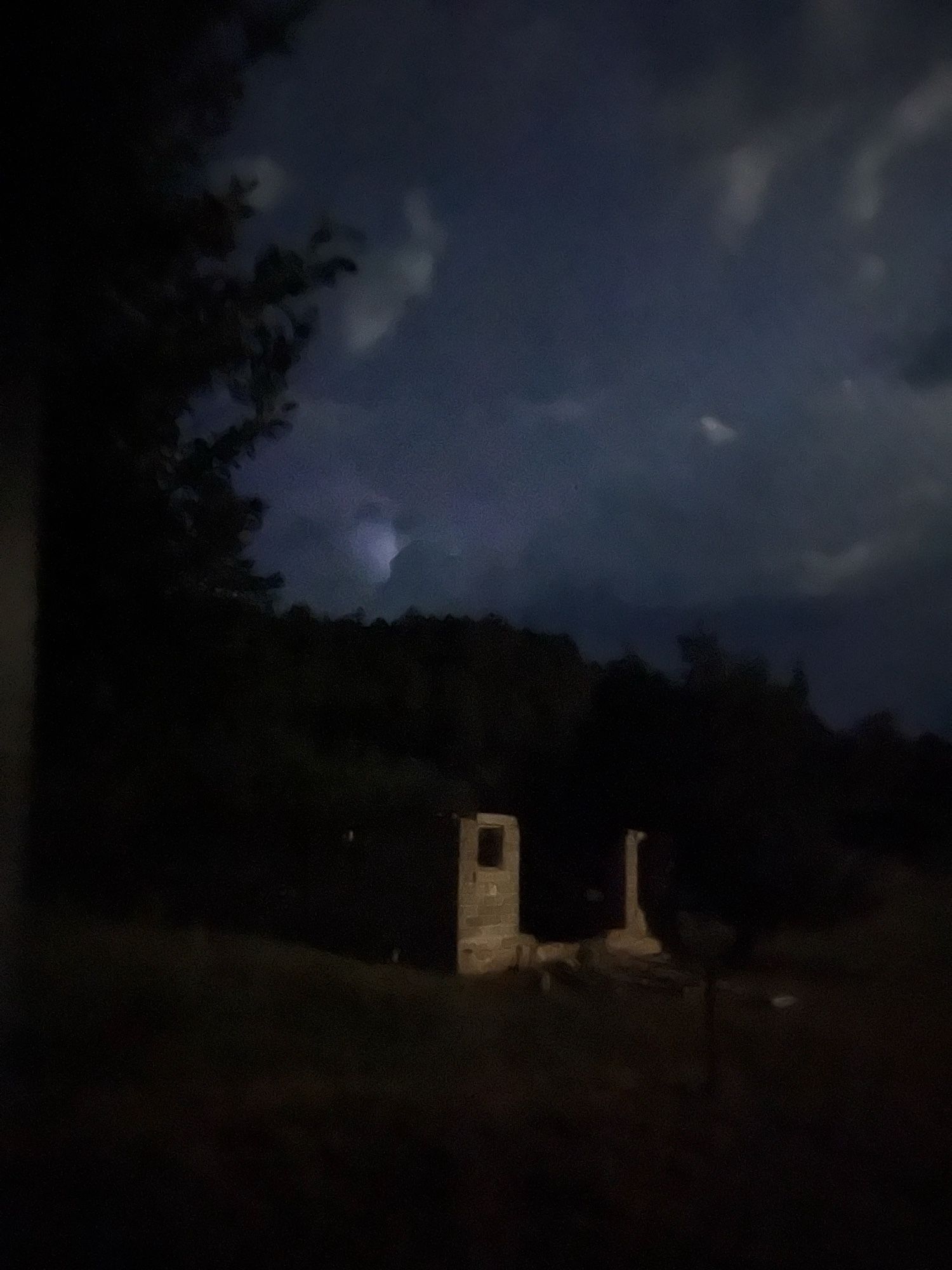 Supermoonlight on the skeleton of an old ranch house