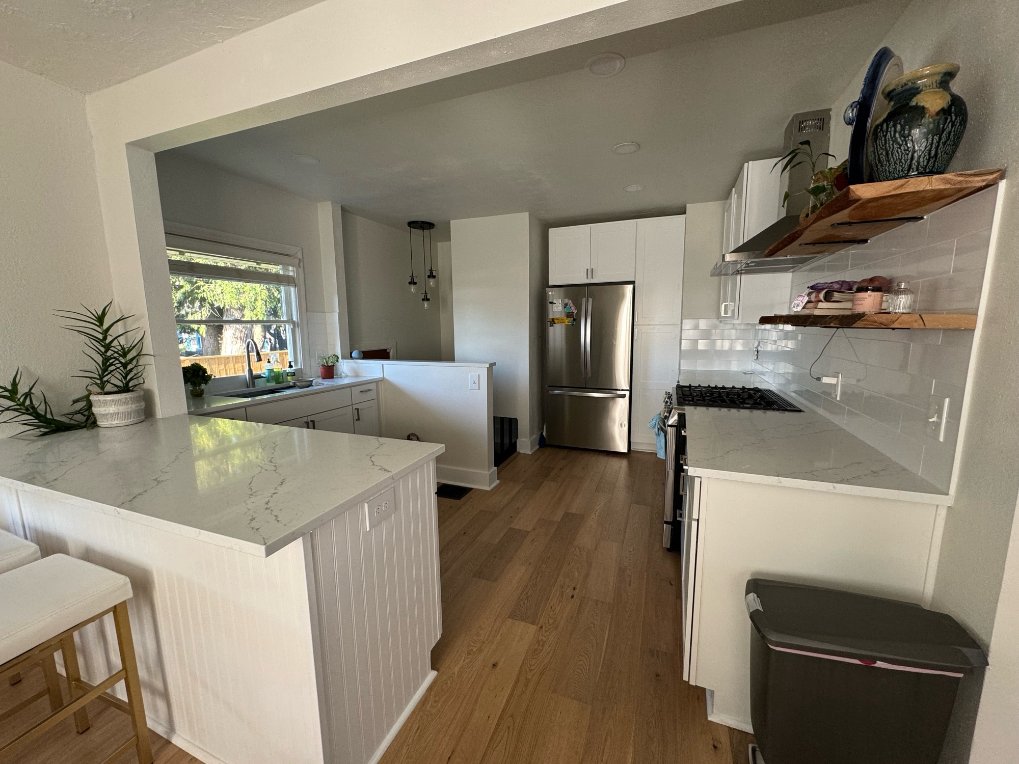 A kitchen with counters free clutter. It is glorious