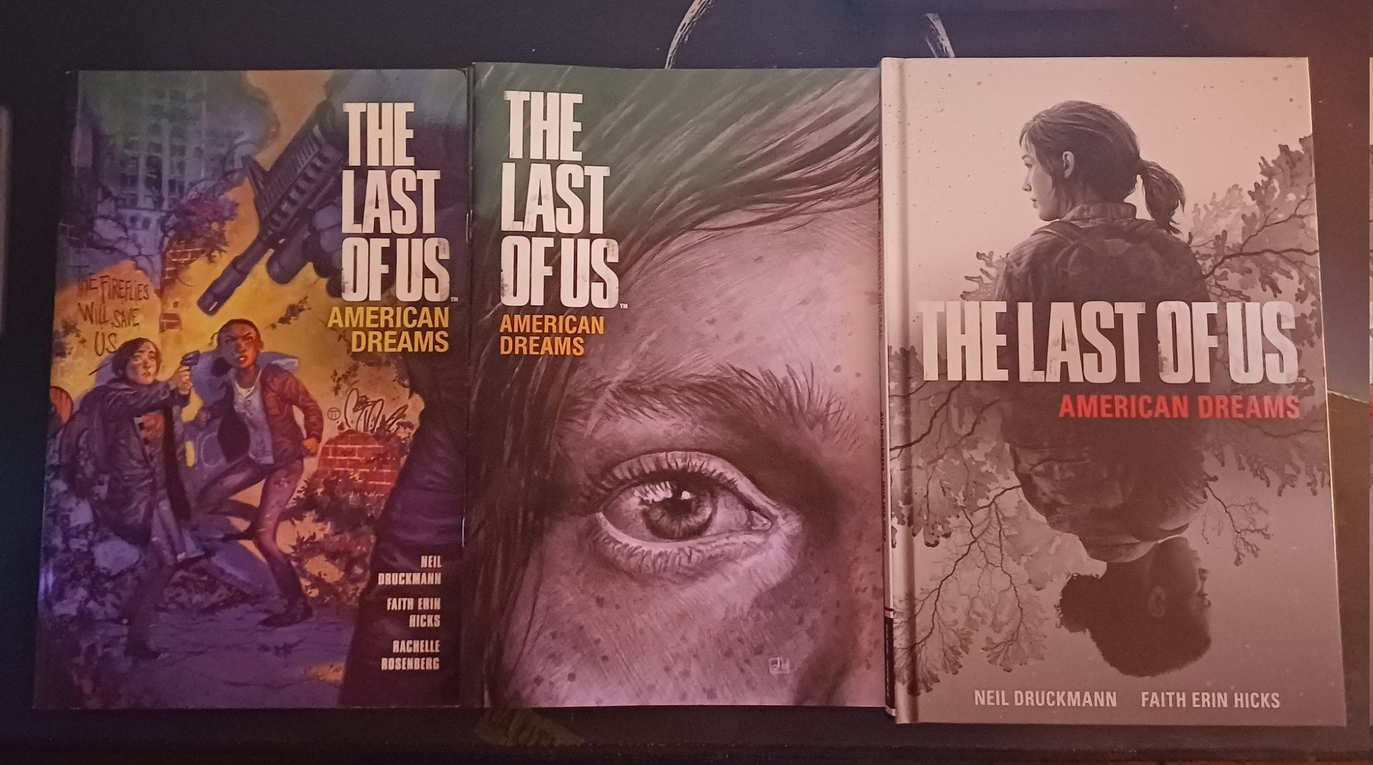 The soft cover commercial version, individual paperback version from The Last of Us Part 1 Firefly Edition, and hardcover edition from The Last of Us Complete Collector's Edition side by side