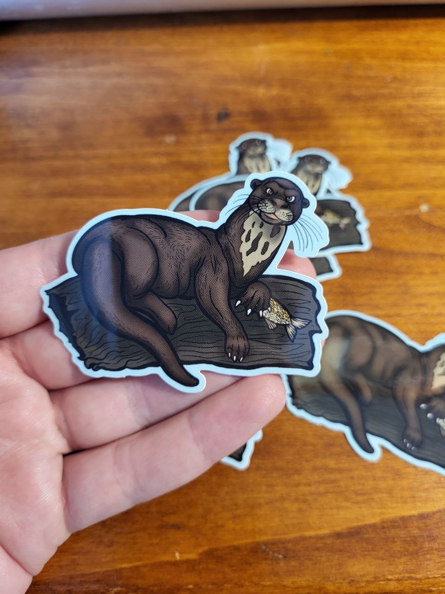 a photo of giant river otter stickers