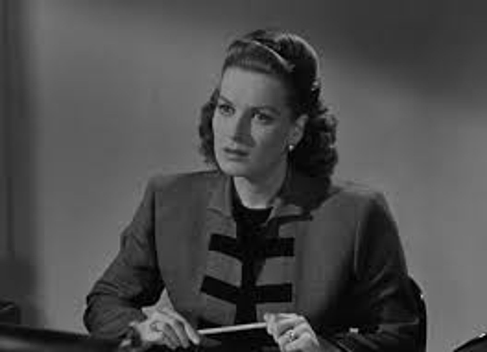 Maureen O’Hara in meeting with the “Macy’s company psychologist” from the seasonal classic Miracle on 34th Street