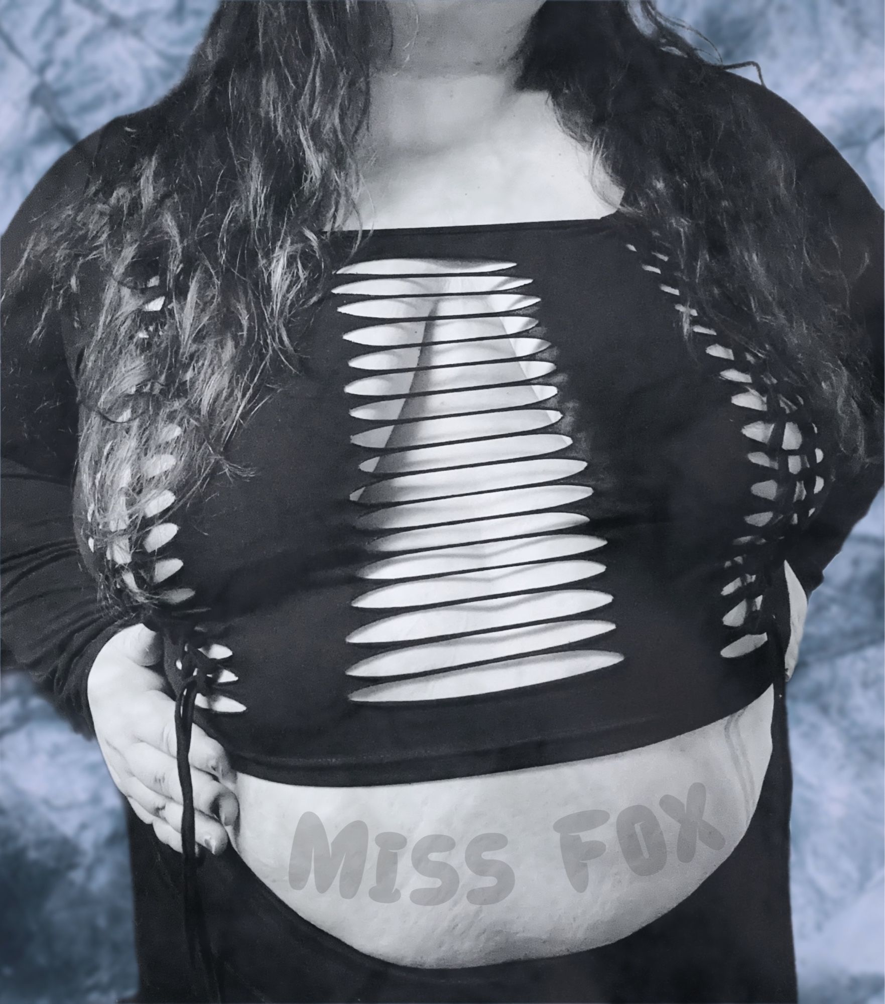 Bbw Domme in a slit up top, revealing in the middle and the edges