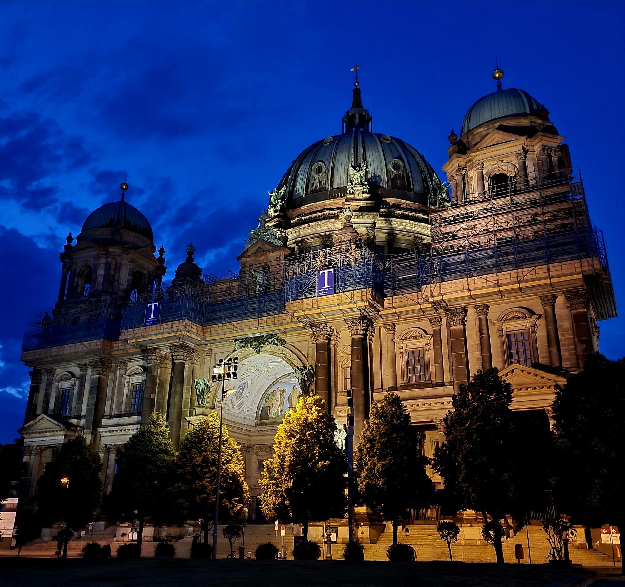 Berliner Dom at night, with dramatic lighting.