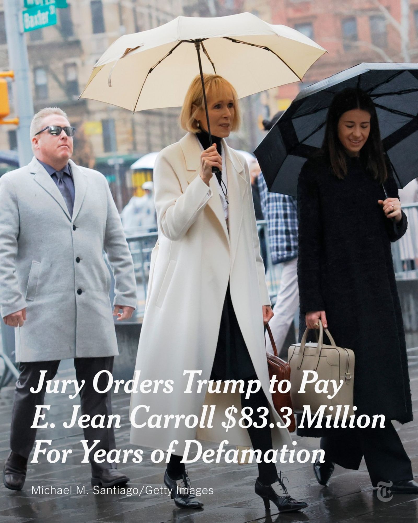 E. Jean Carroll wearing a cream coat and holding an umbrella. A headline reads: "Jury Orders Trump to Pay Carroll $83.3 Million for Years of Defamation." Photo by Michael M. Santiago/Getty Images.