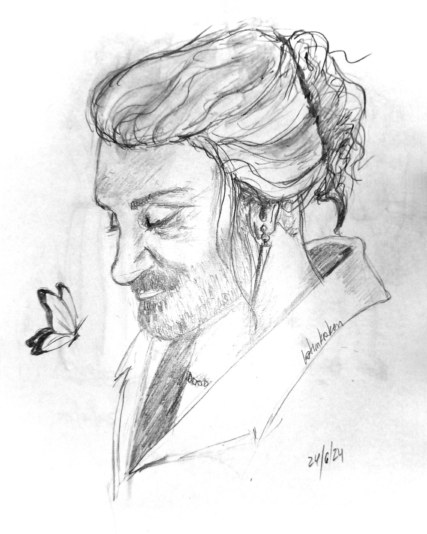 Pencil sketch of the character Edward Teach, portrayed by Taika Waititi. In the drawing, his left profile is visible and he's wearing his hair in a bun, a short beard and an earing. His eyes seem closed. In front of him there's a little butterfly.
Signed by latinkraken on June 24th, 2024.