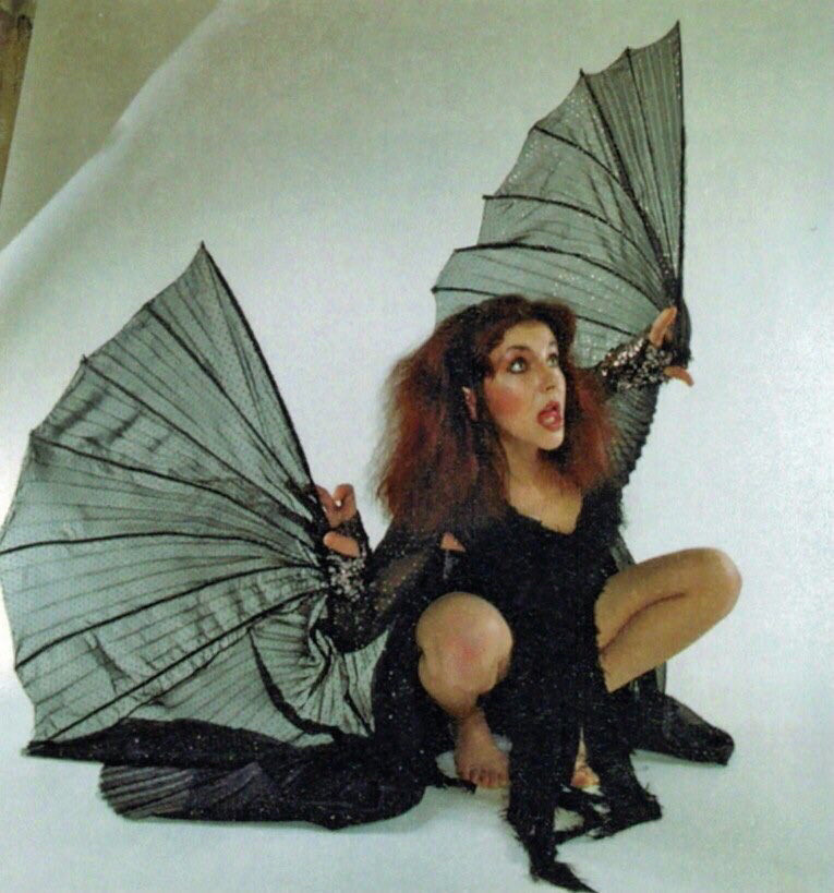 Kate bush with bat wings