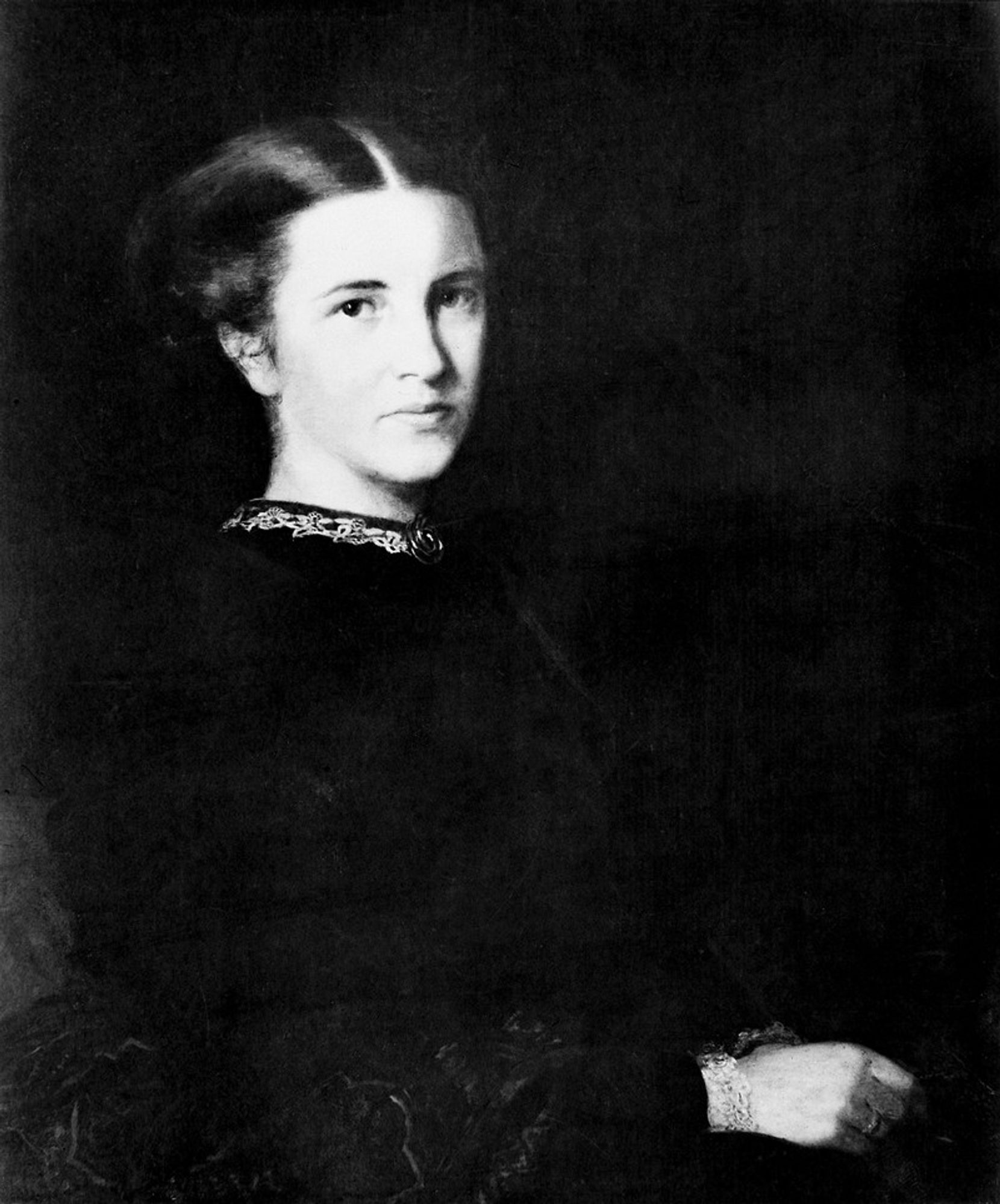 Black and white portrait of a young Elizabeth Barrett. she is a white woman with dark hair.