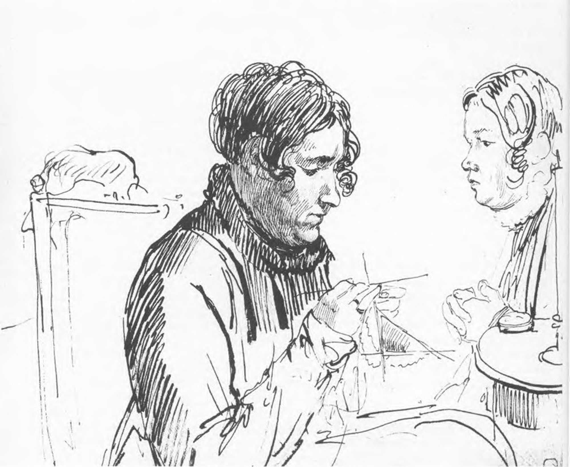 Knitting. Two women at the table